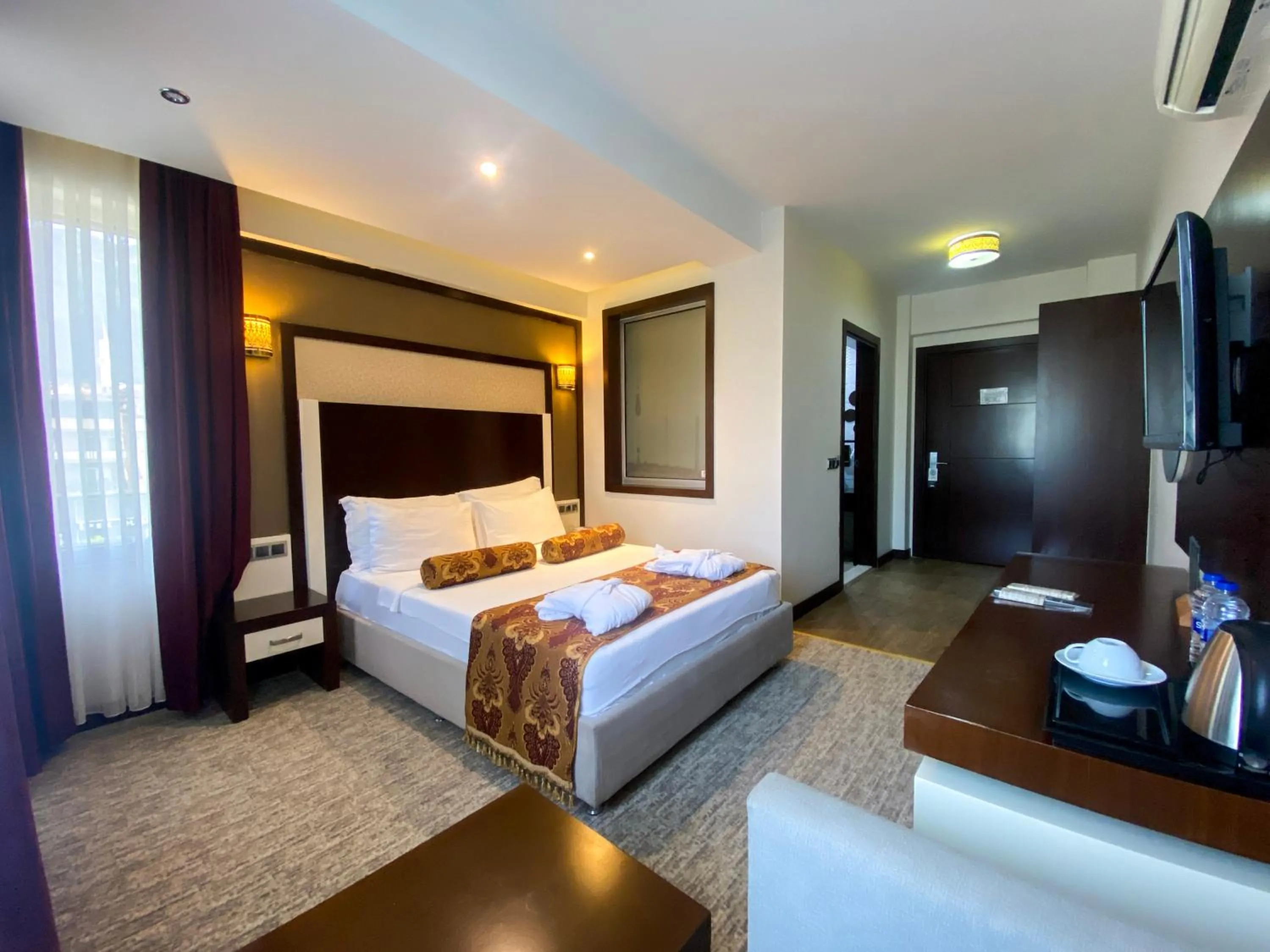 Bed in Lavin Hotel & Spa