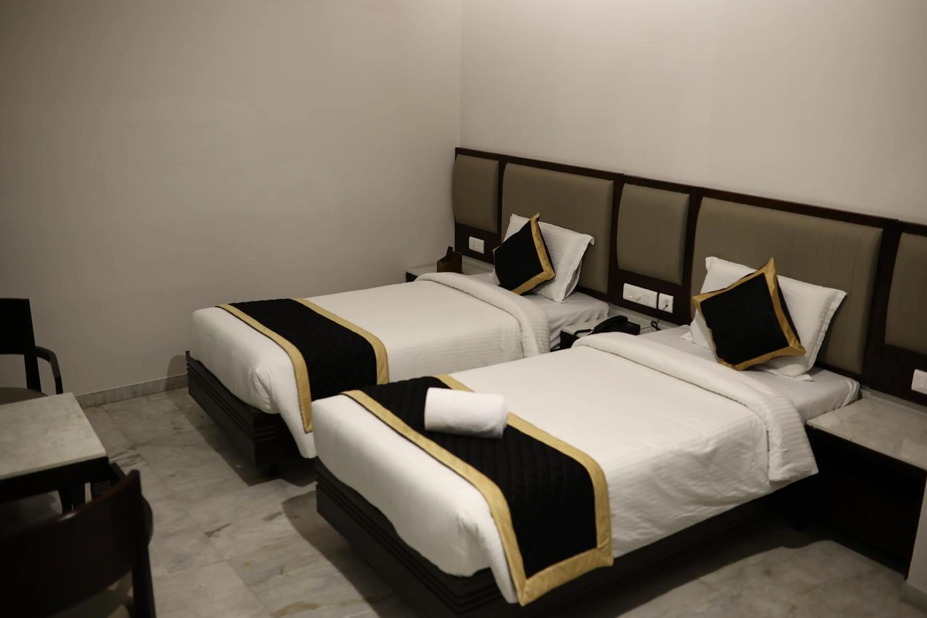 Bedroom in Hotel Saratharajans