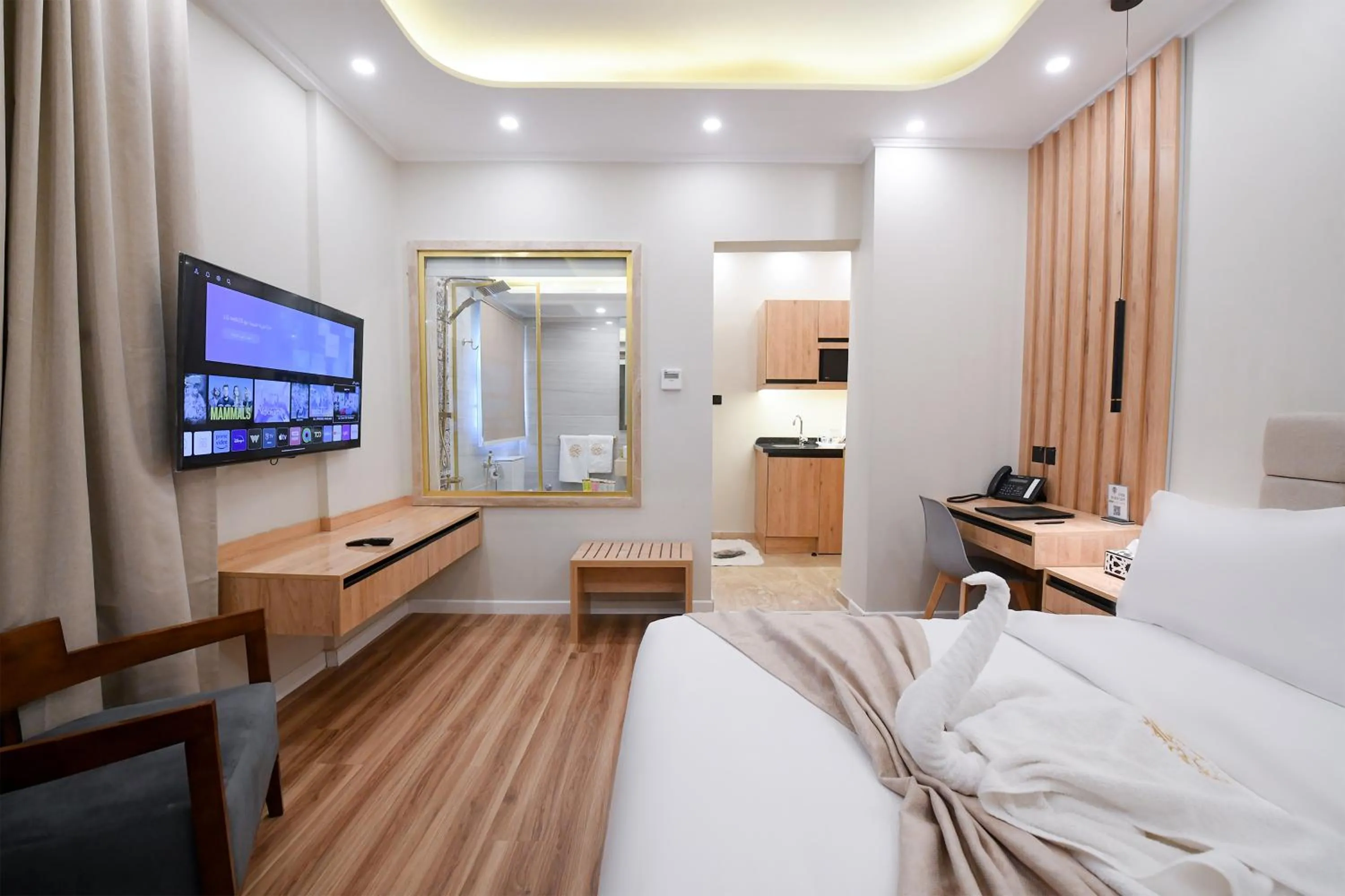 Communal lounge/ TV room, Bed in Arabella Premium Residence - New Cairo