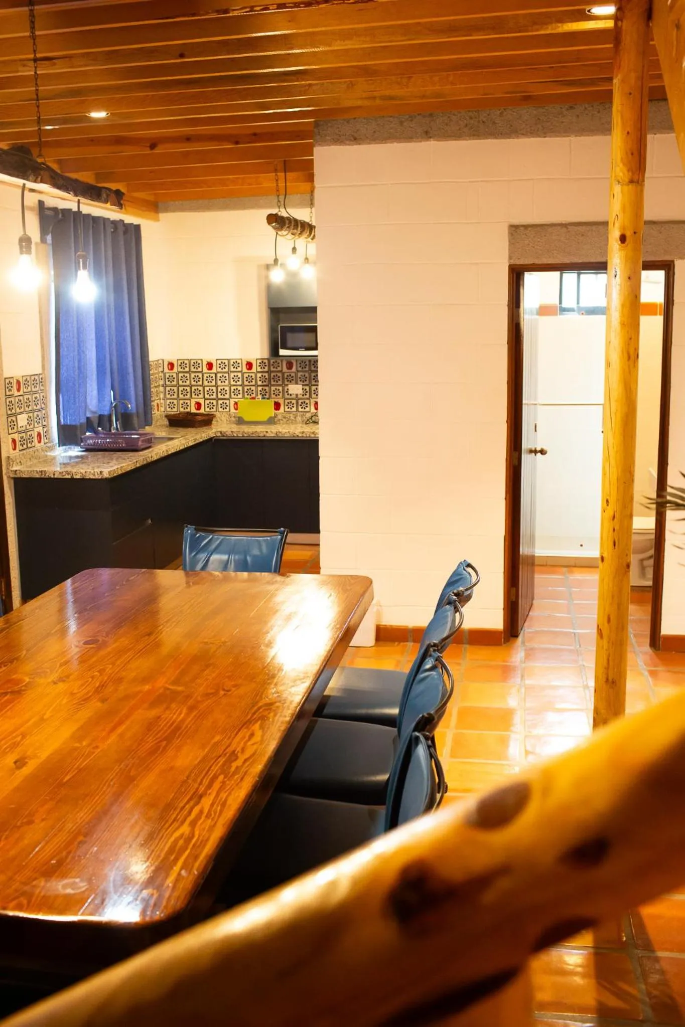 Kitchen or kitchenette in Cabañas Bungalos las Alazanas