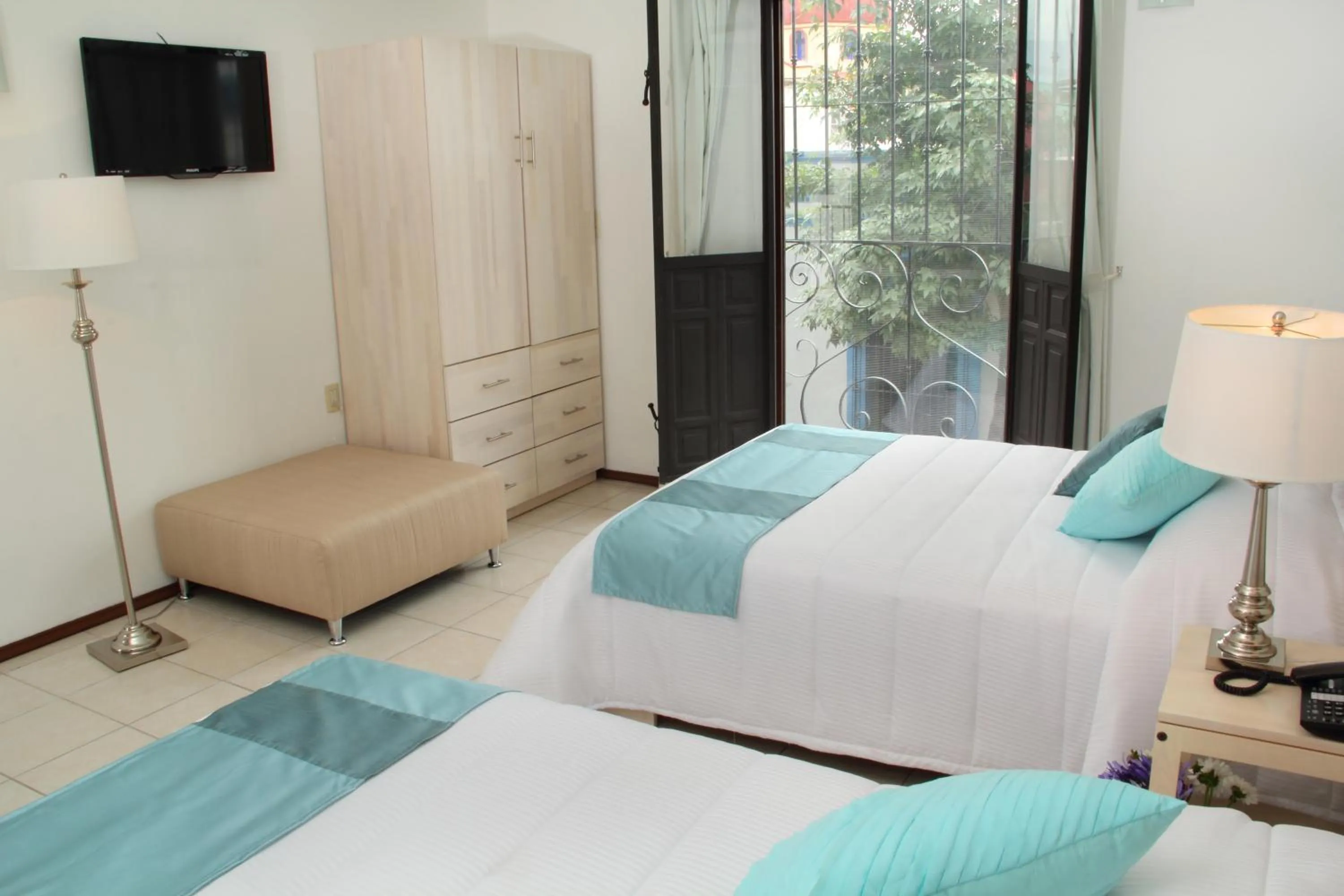 Bed in Hotel La Casa de María