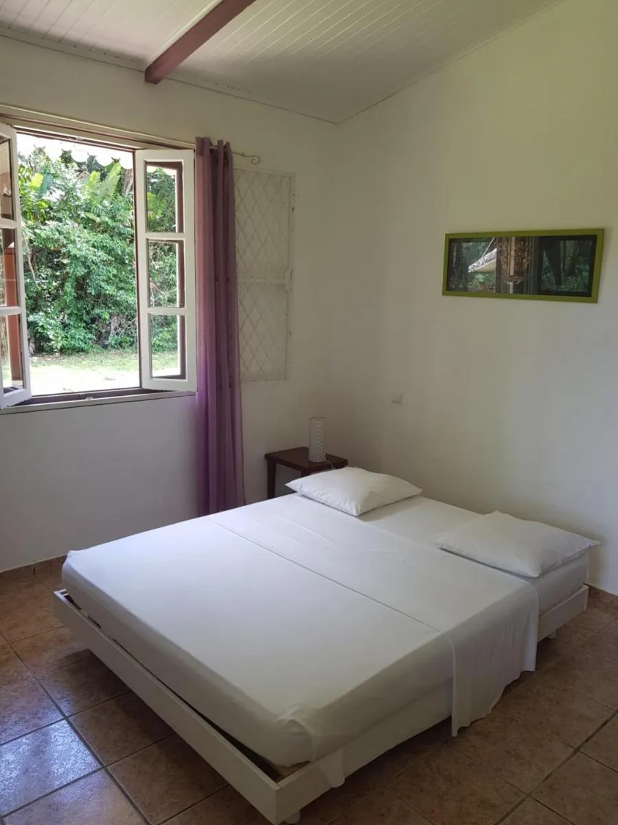 Bed in Hotel La Chaumiere