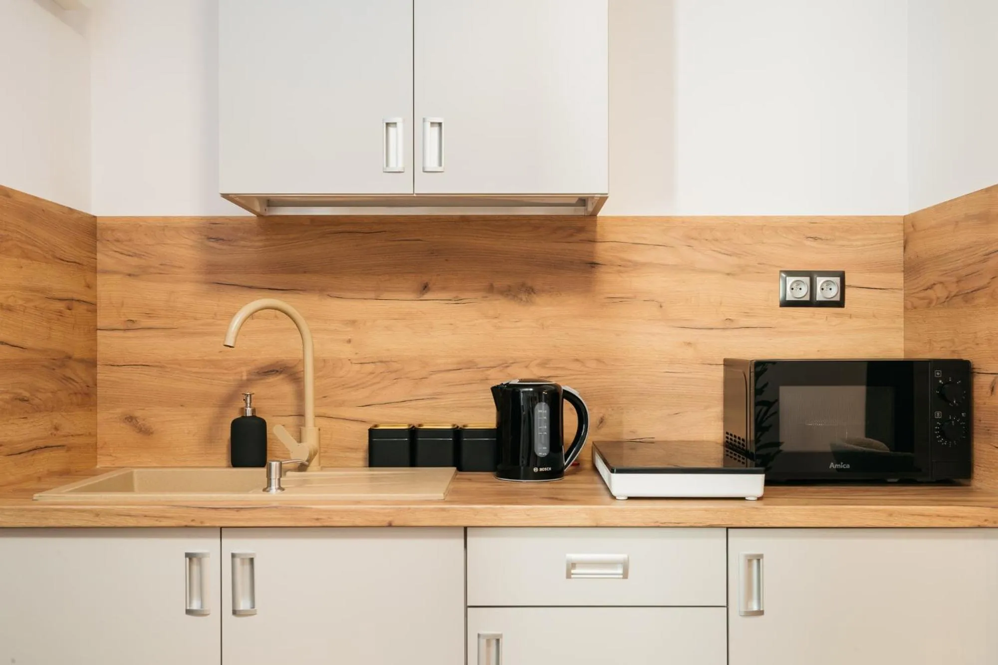 Kitchen or kitchenette in ORSO Rooms & Apartments - LoftAffair Collection