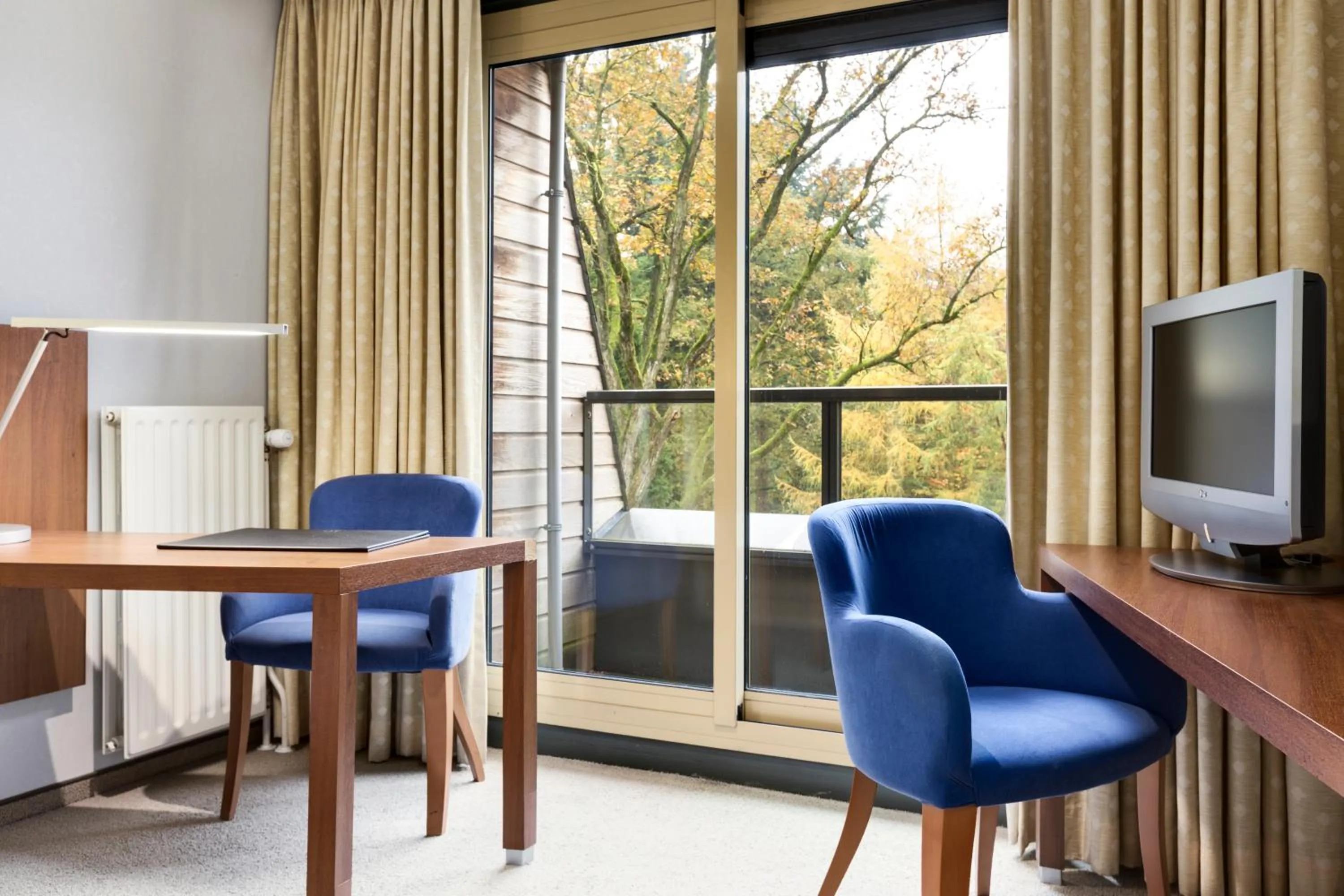 Seating area in Fletcher Hotel-Restaurant Sparrenhorst-Veluwe