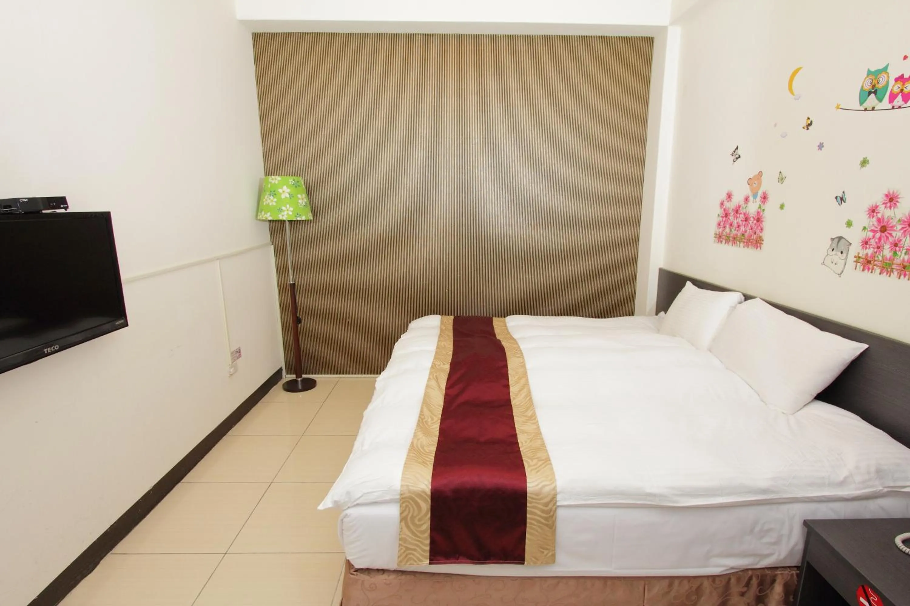 Bed in Sanyi Sakura Resort