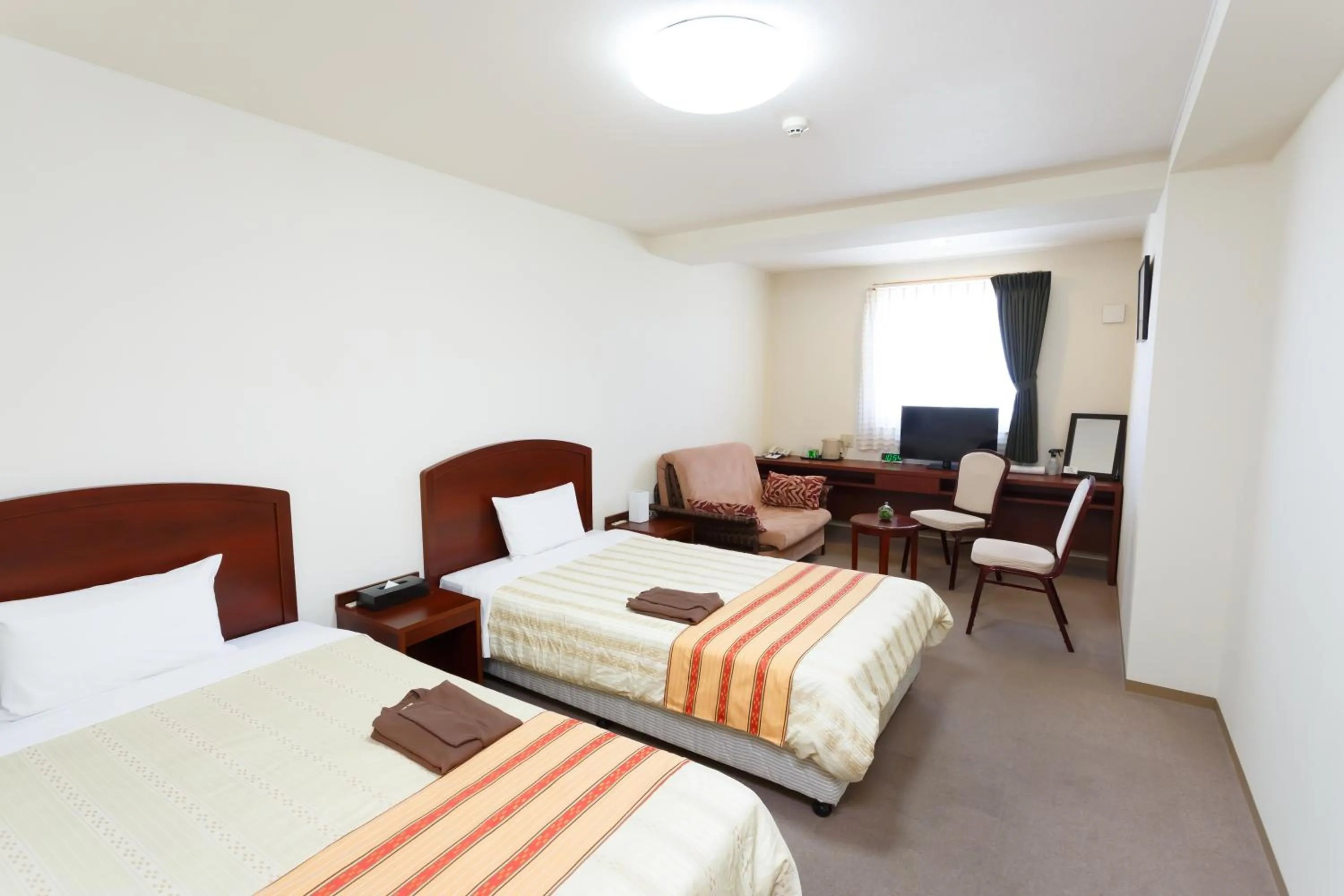 Photo of the whole room, Bed in Hotel Peace Island Miyakojima Shiyakusho Tori