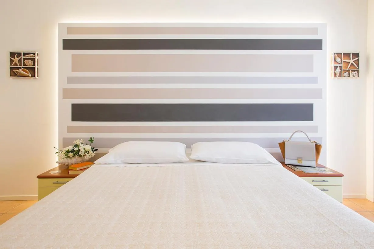 Bed in Hotel Pacific