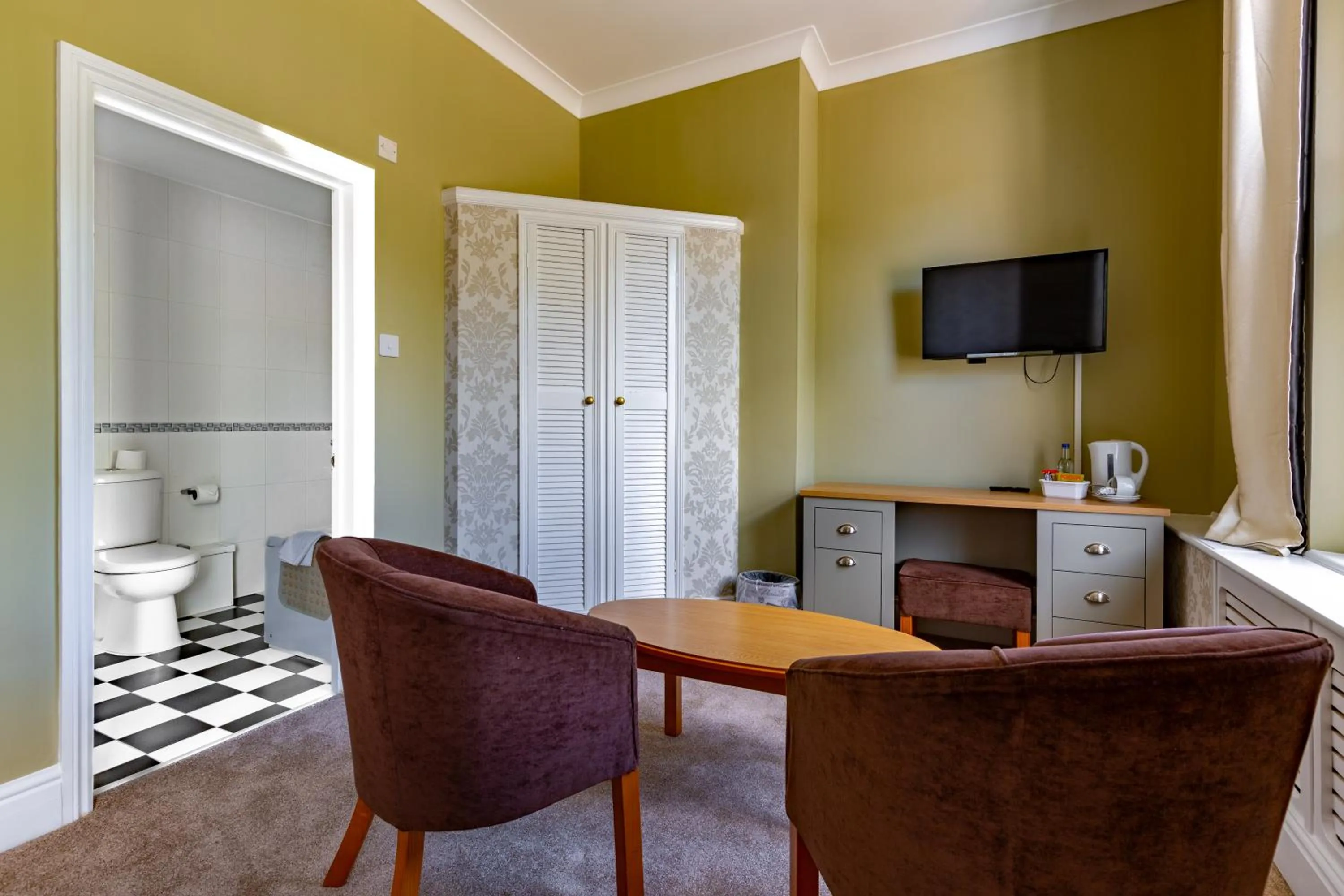 Seating area in Woodland Manor Hotel