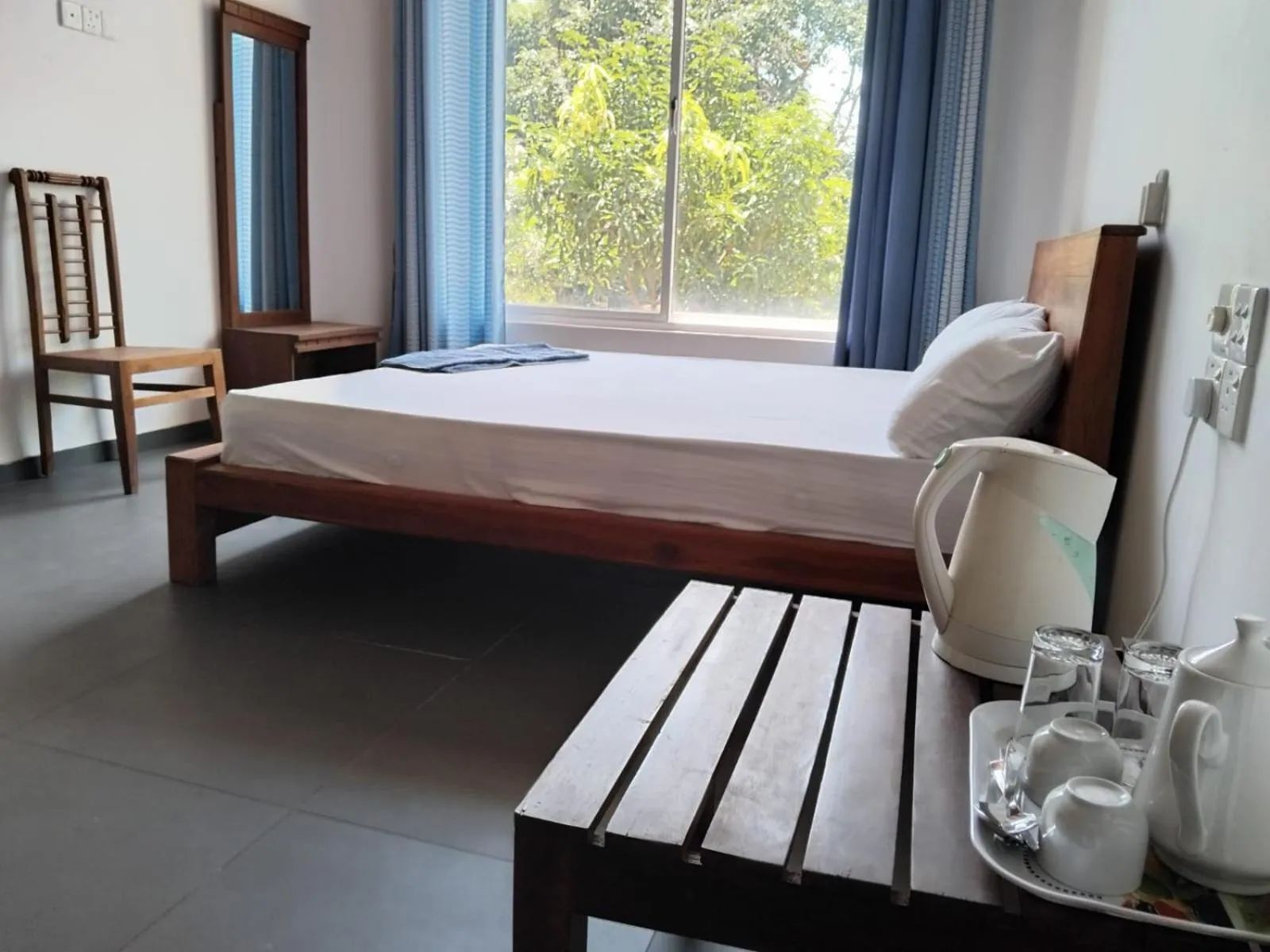 Bed in Esha Beach Resort Rooms