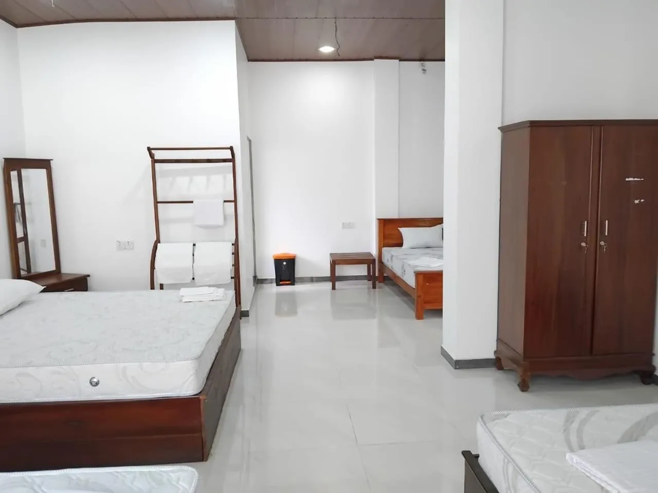 Bed in Esha Beach Resort Rooms