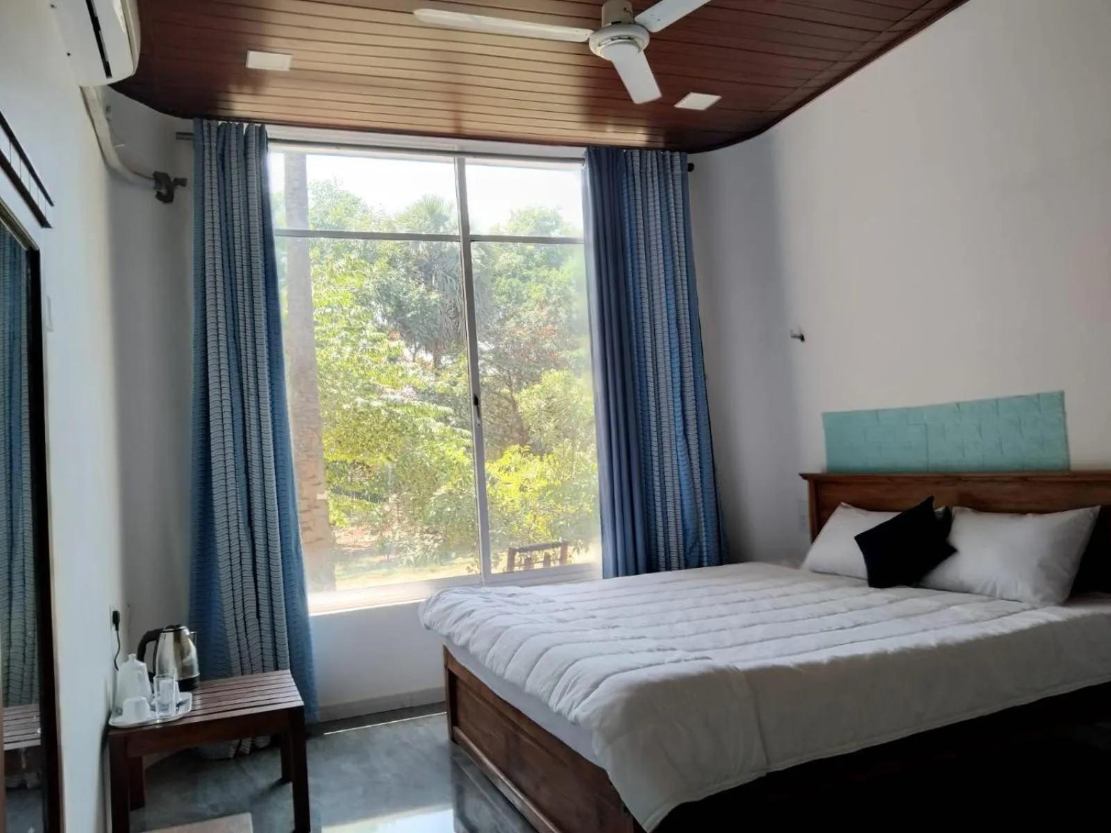 Bed in Esha Beach Resort Rooms