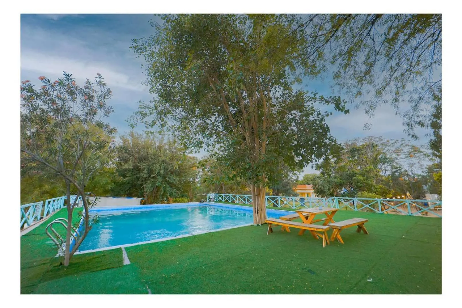 Swimming pool in Aranya by Stories