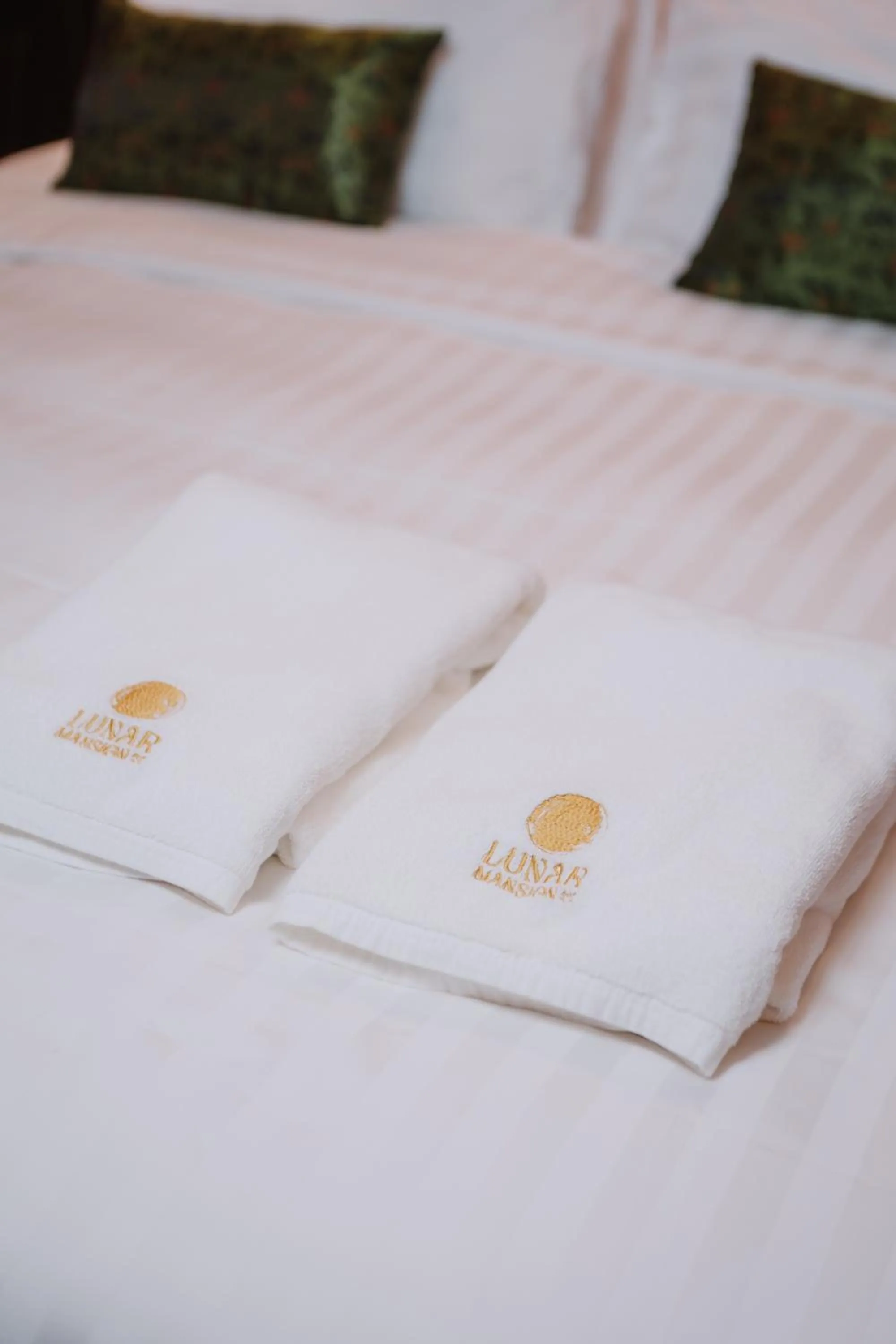 towels, Bed in Lunar Mansion Hotel