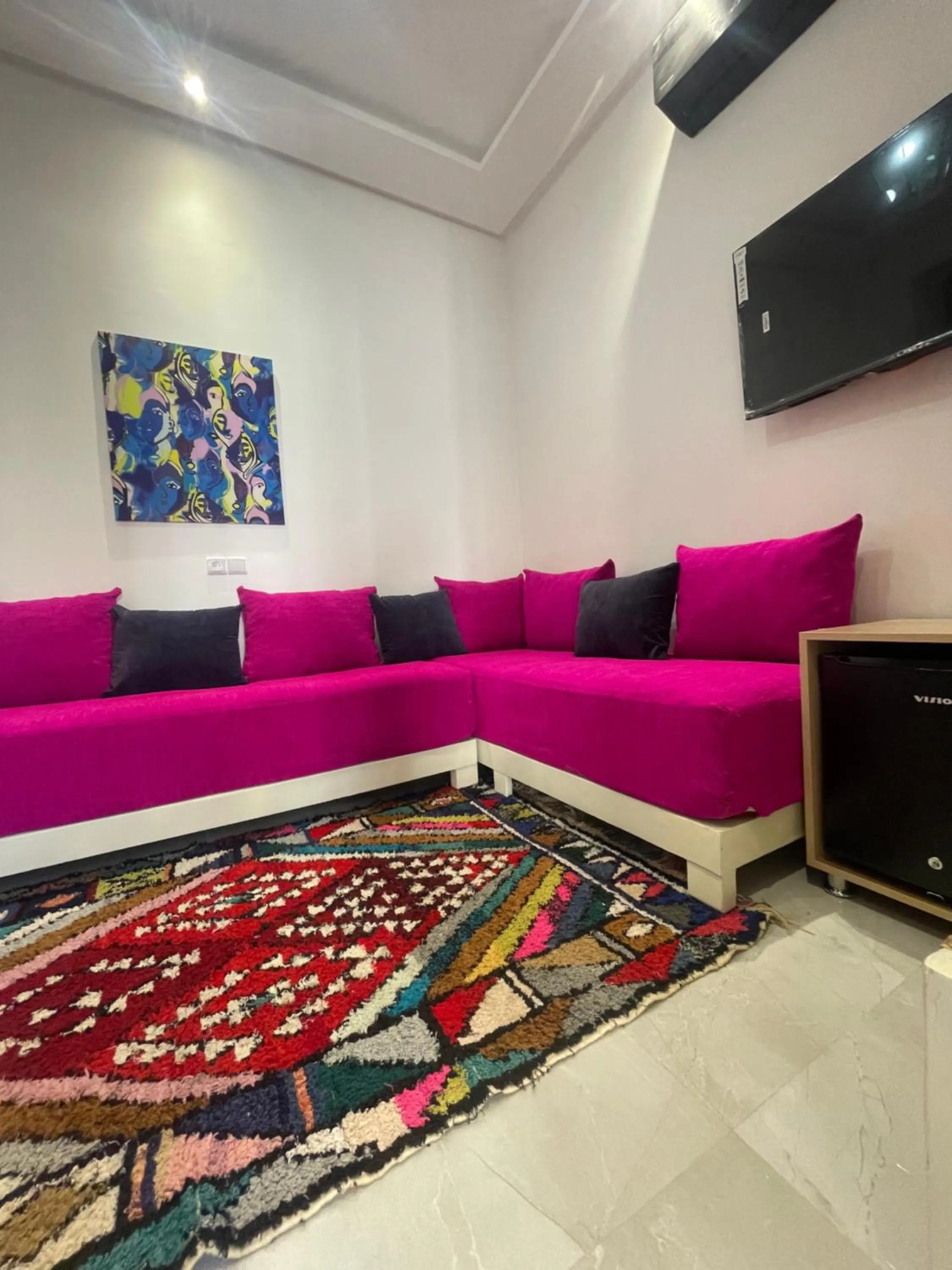 Communal lounge/ TV room in Riad hotel Cecil