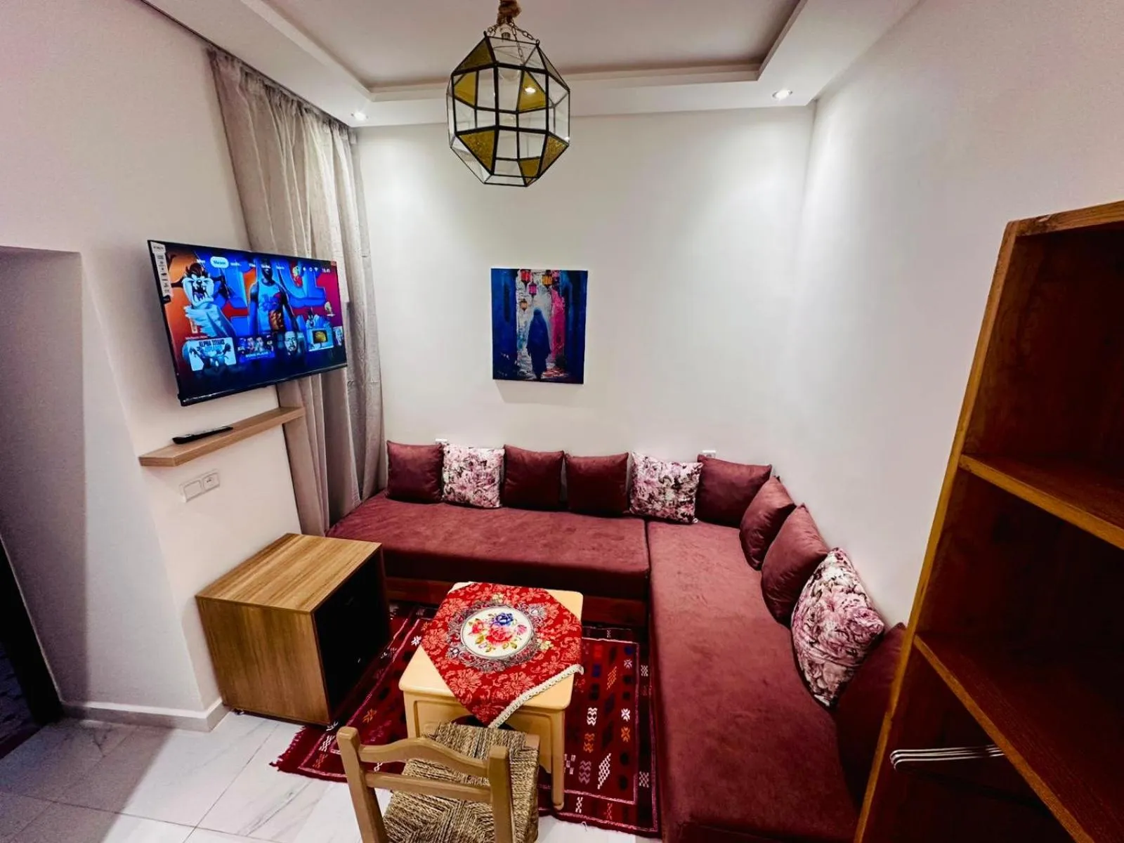 Communal lounge/ TV room in Riad hotel Cecil