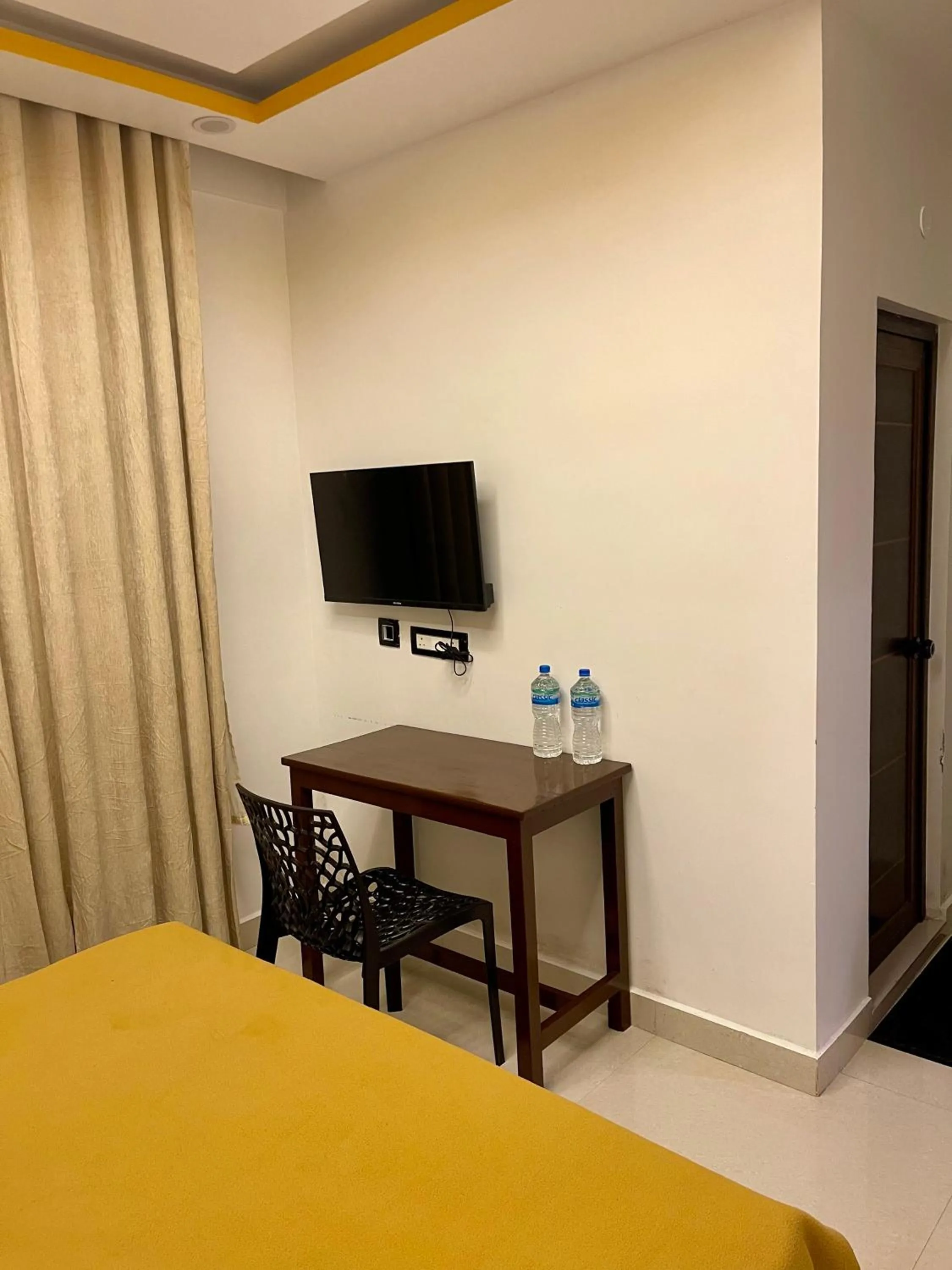 Bed in Puthookkadans Mareena Lodge