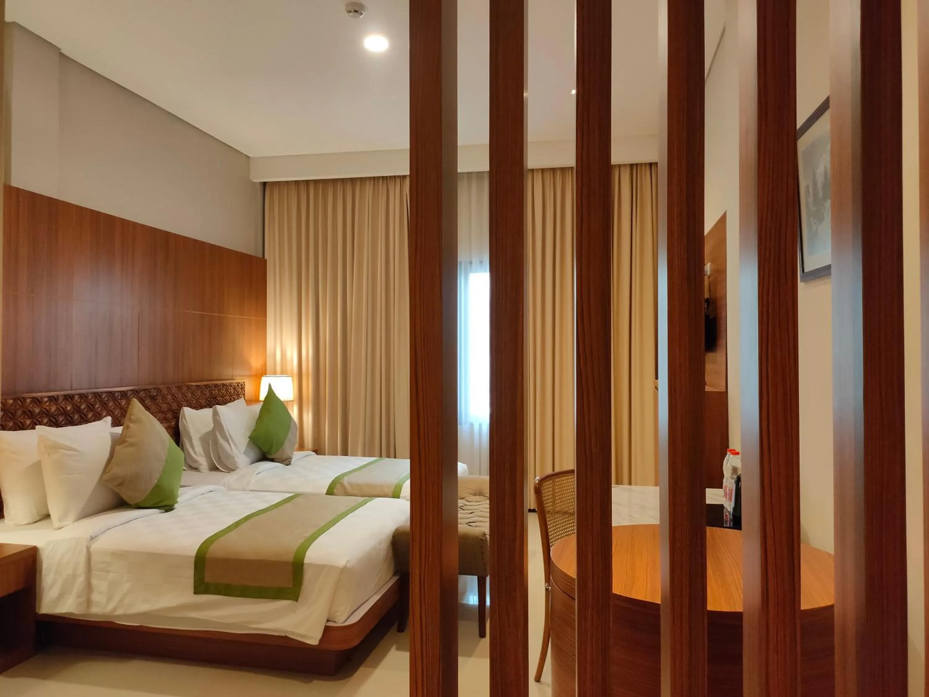 Bed in Wyndham Garden Yogyakarta Hotel Conference & Action Park