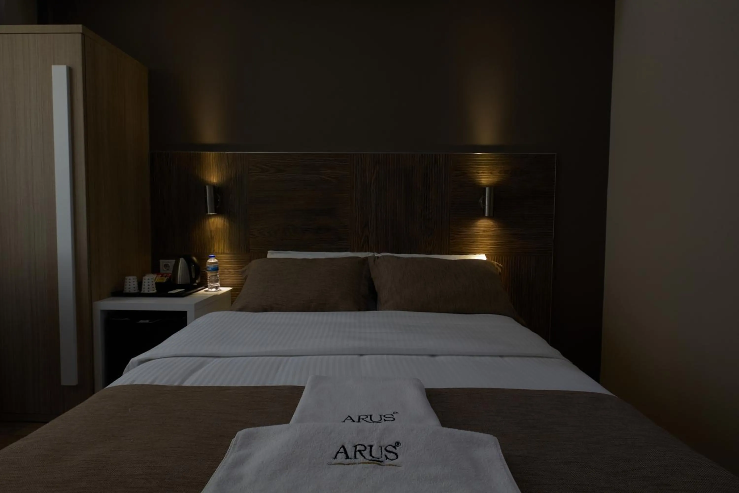 Bed in Arus Hotel