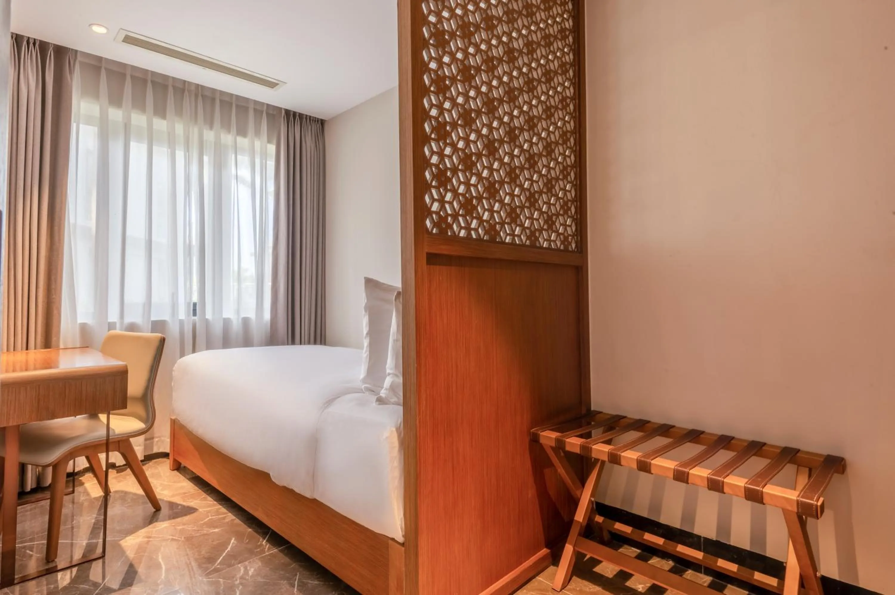 Bedroom, Bed in KOI Resort & Residence Da Nang - Inclusive Spa access