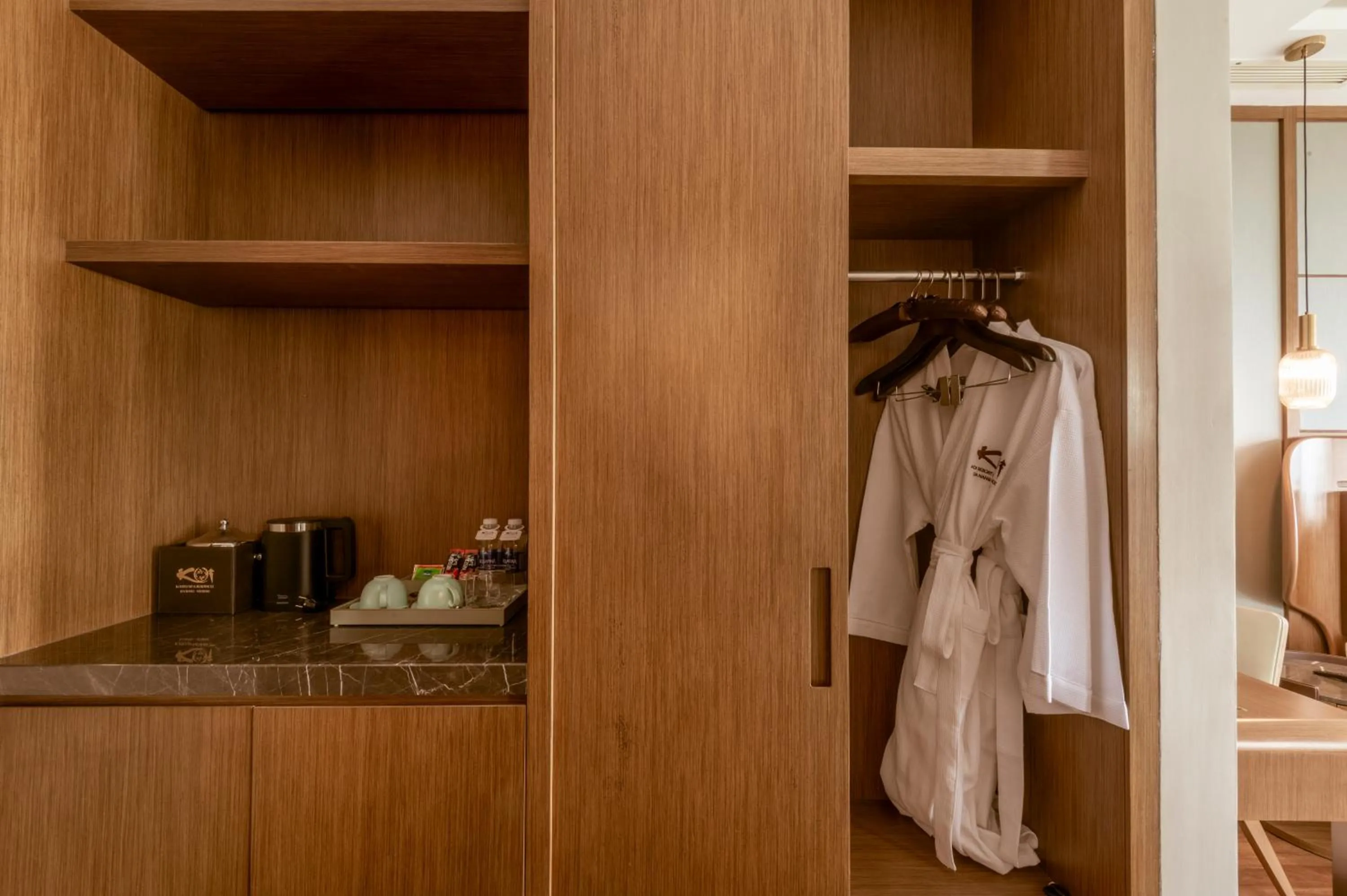 wardrobe in KOI Resort & Residence Da Nang - Inclusive Spa access