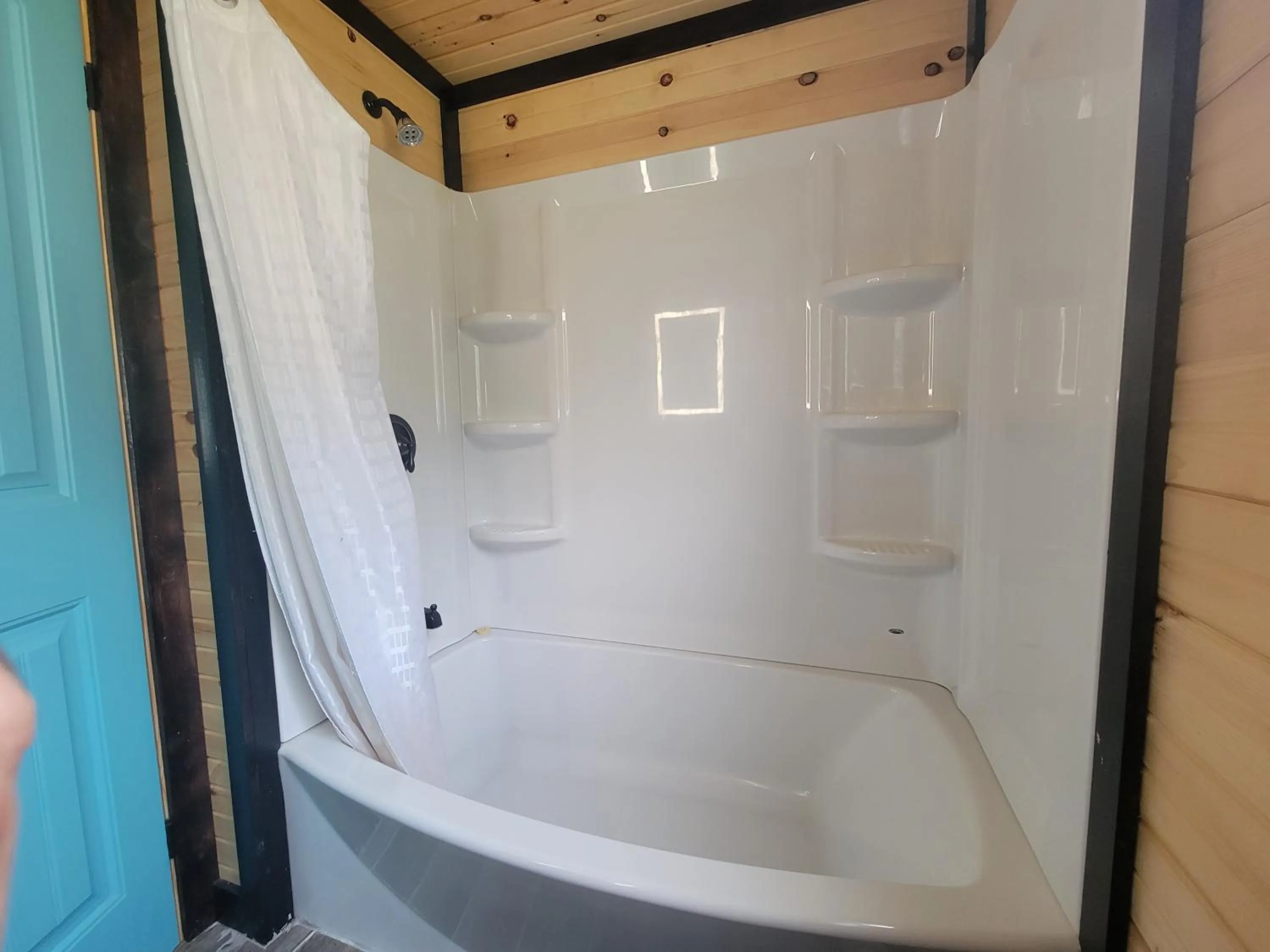 Shower in Stoneburg Cove Cottages