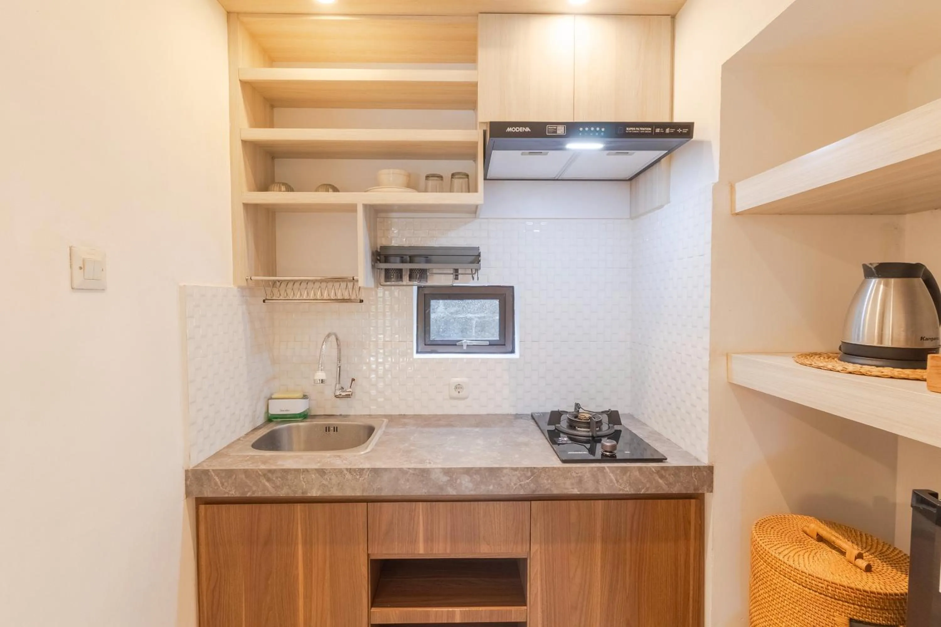 Kitchen or kitchenette in Wayan Homestay Sanur