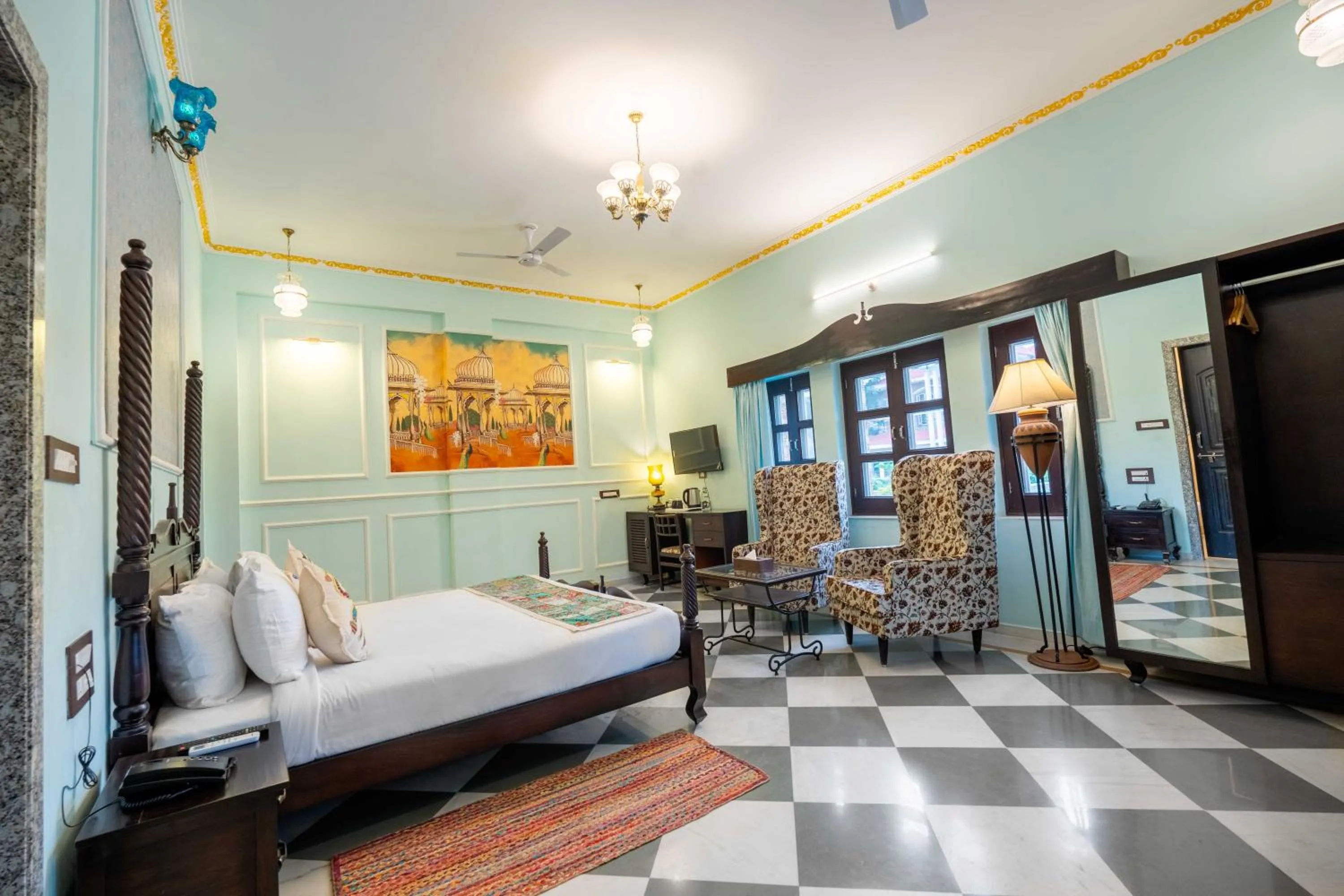 Seating area, Bed in Amaatra Resorts