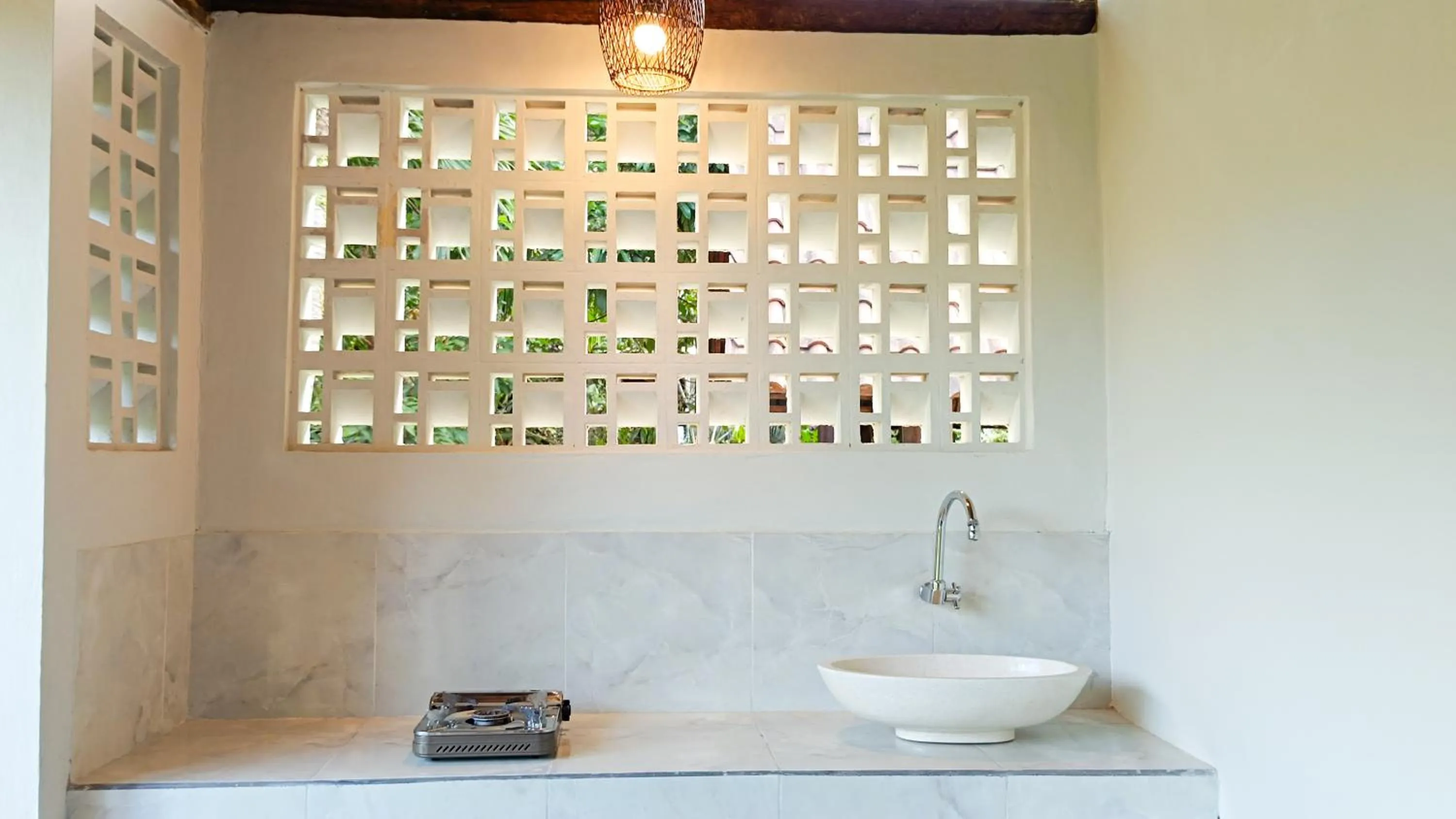 Kitchen or kitchenette in Lumbung Asri Cottage