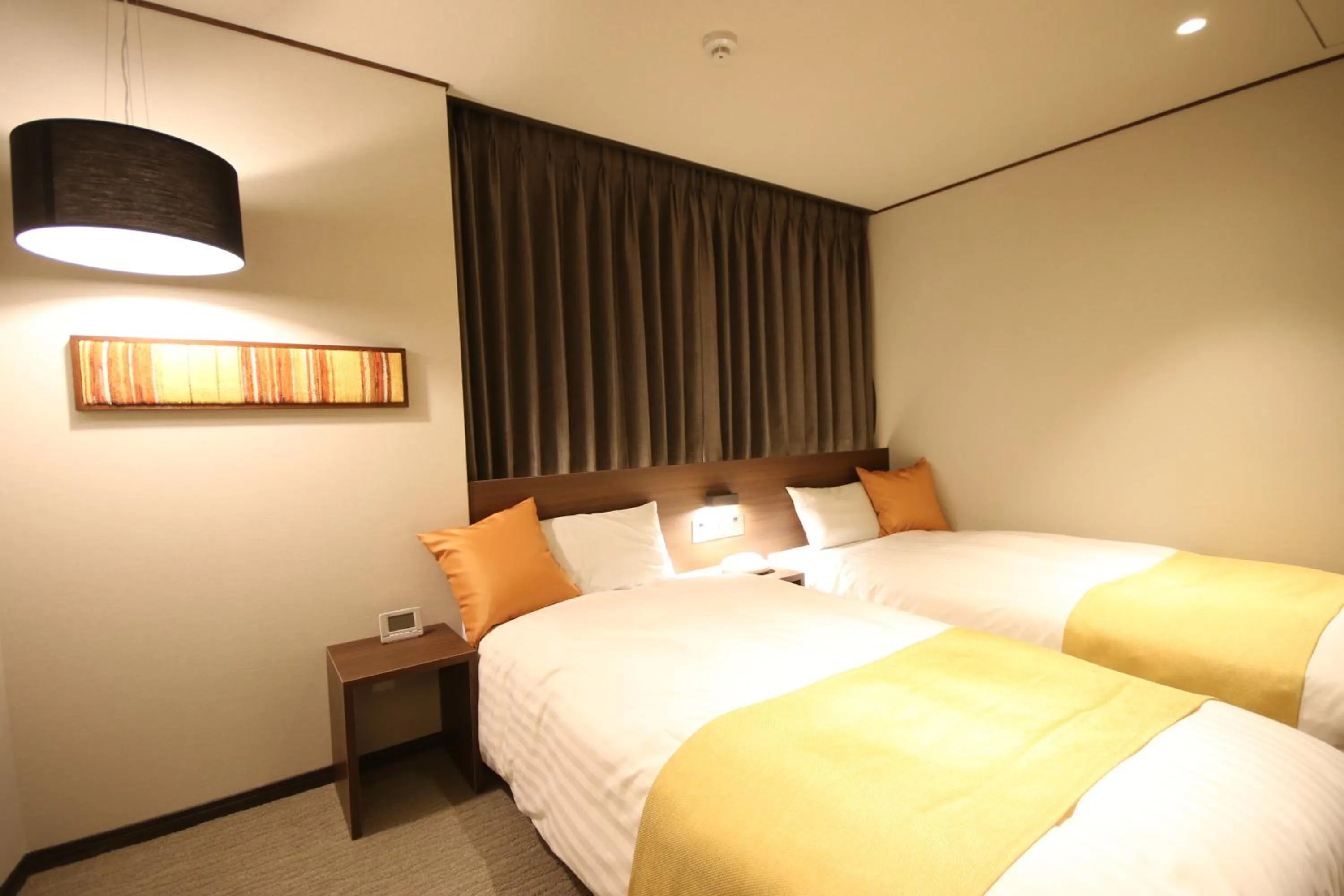 Bed in Kita Hotel