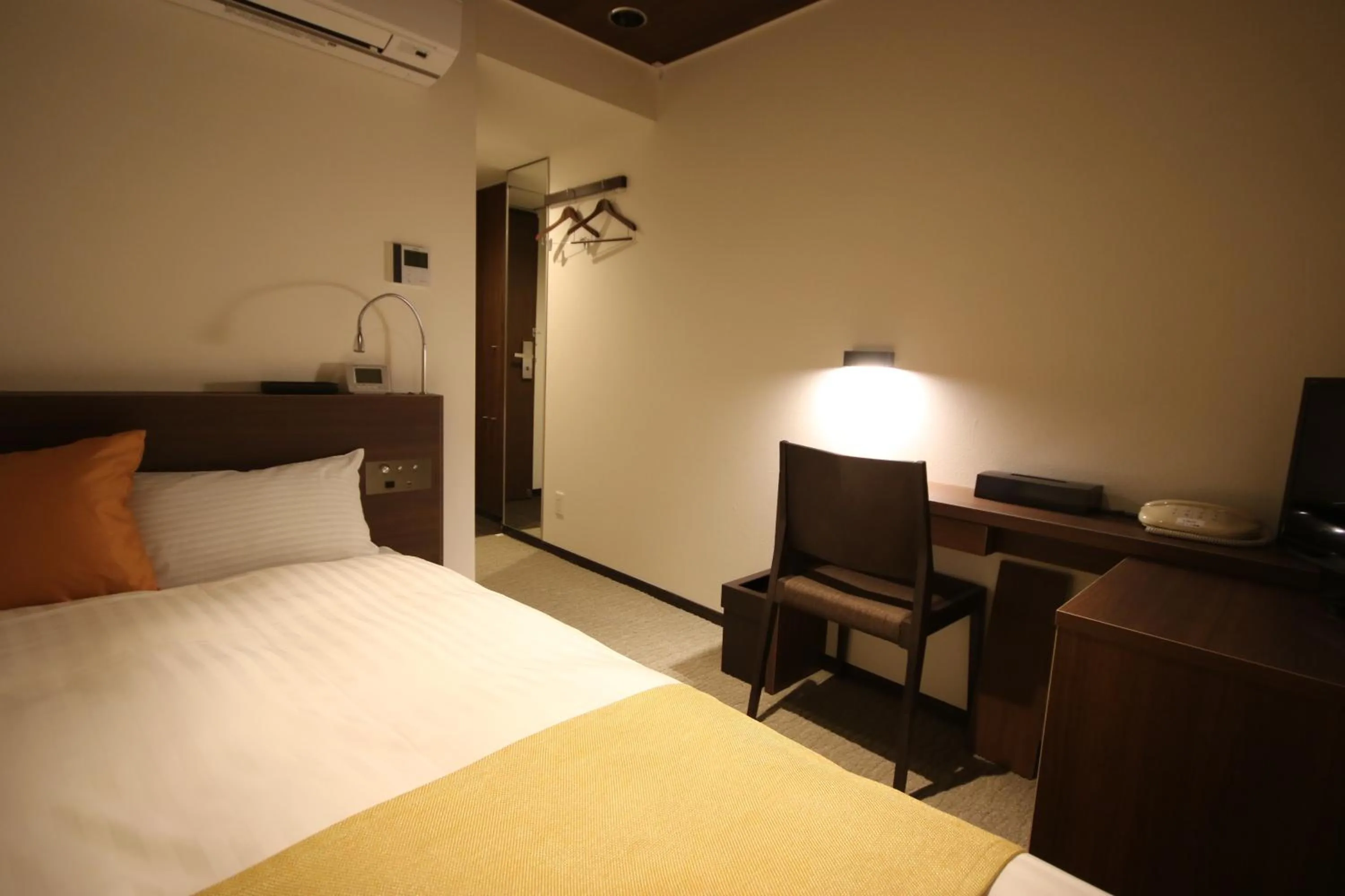 Bed in Kita Hotel
