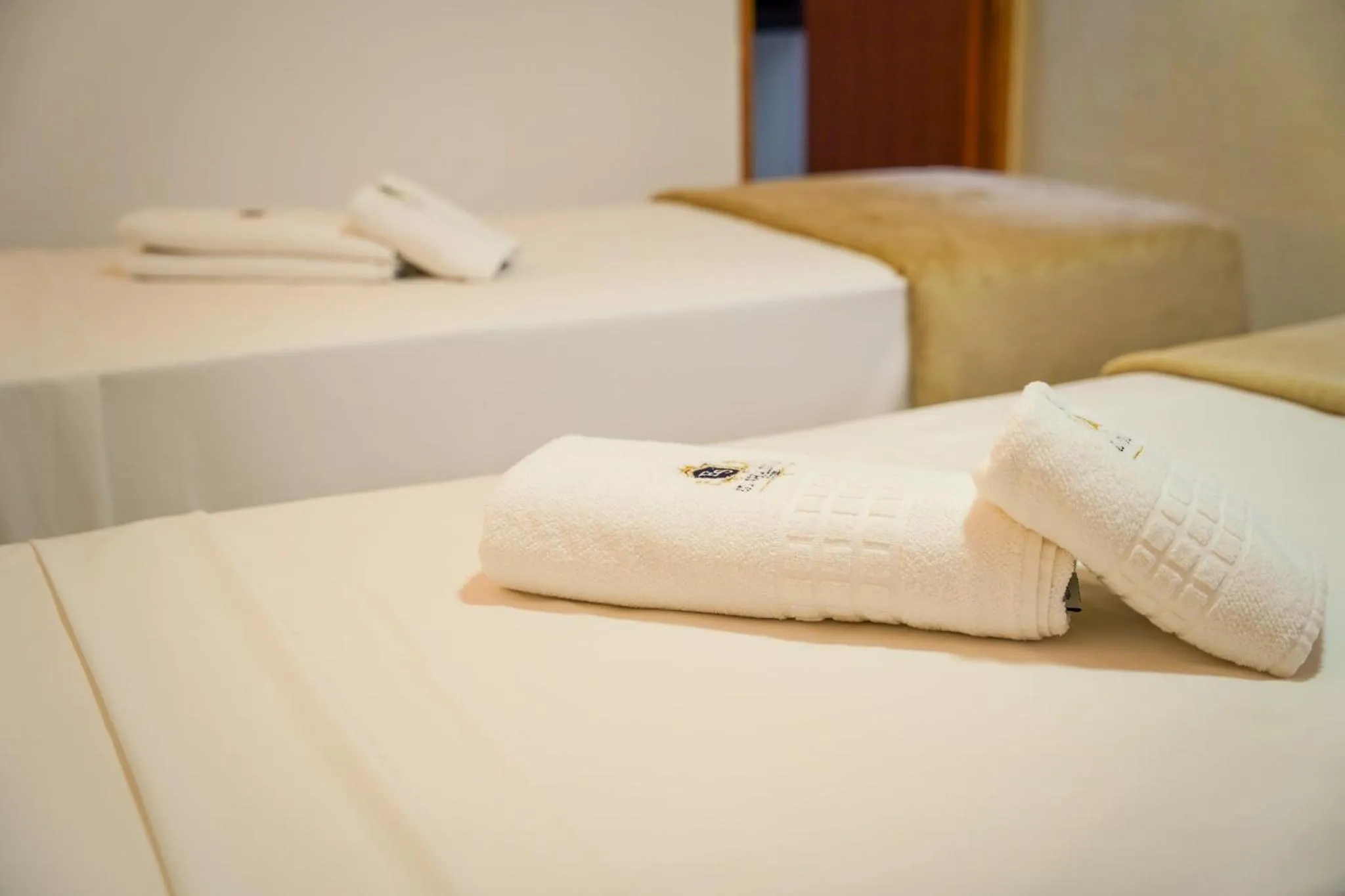 Bed in EL SHADDAI HOTEL