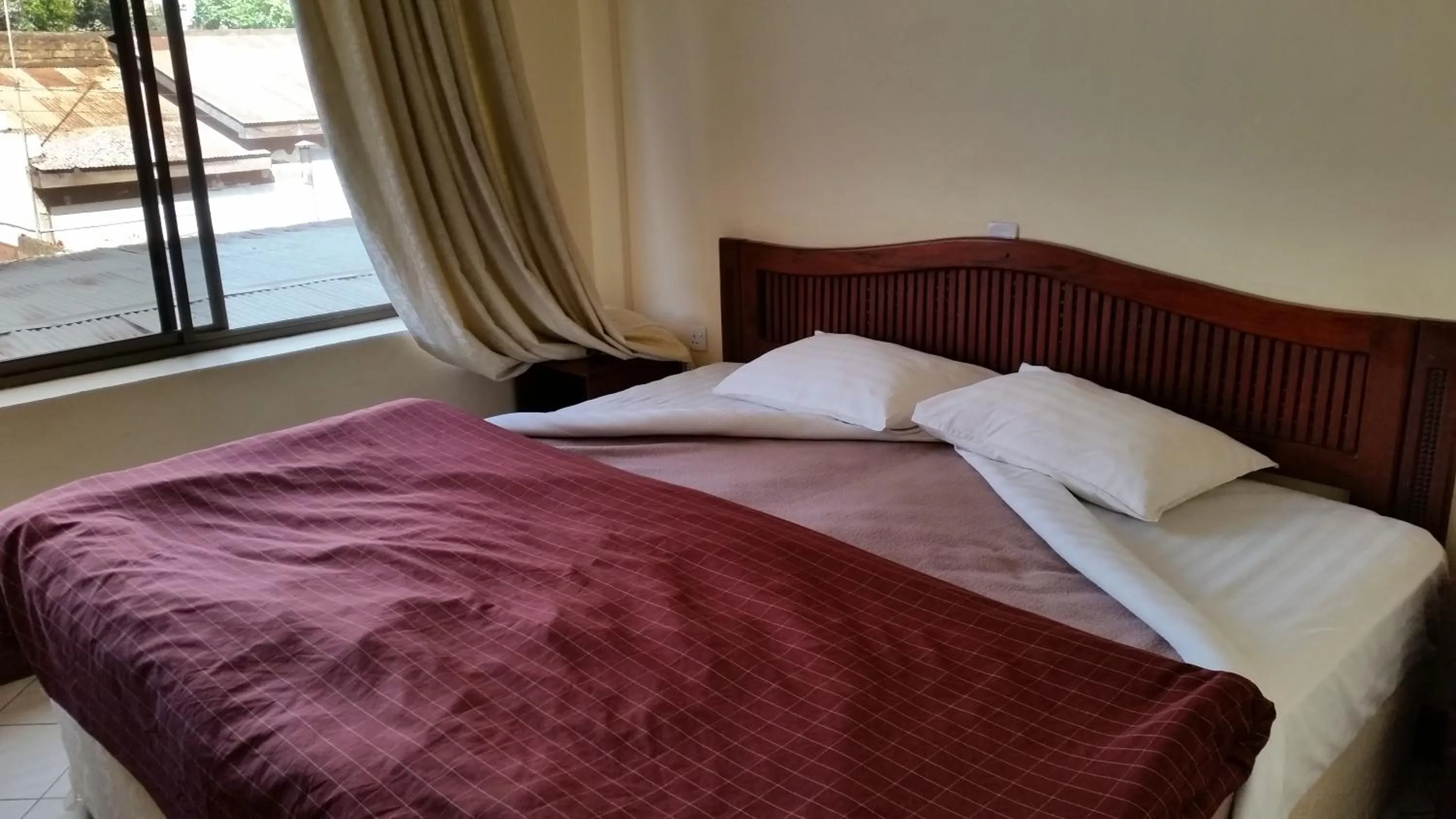 Bedroom, Bed in Moshi Leopard Hotel