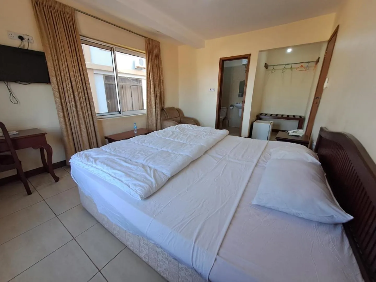 Bed in Moshi Leopard Hotel