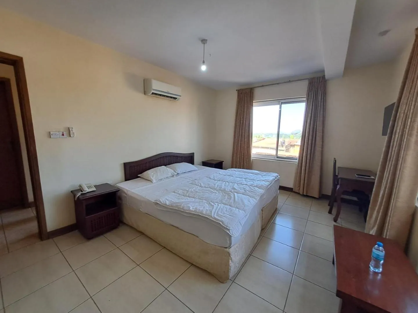 Bed in Moshi Leopard Hotel