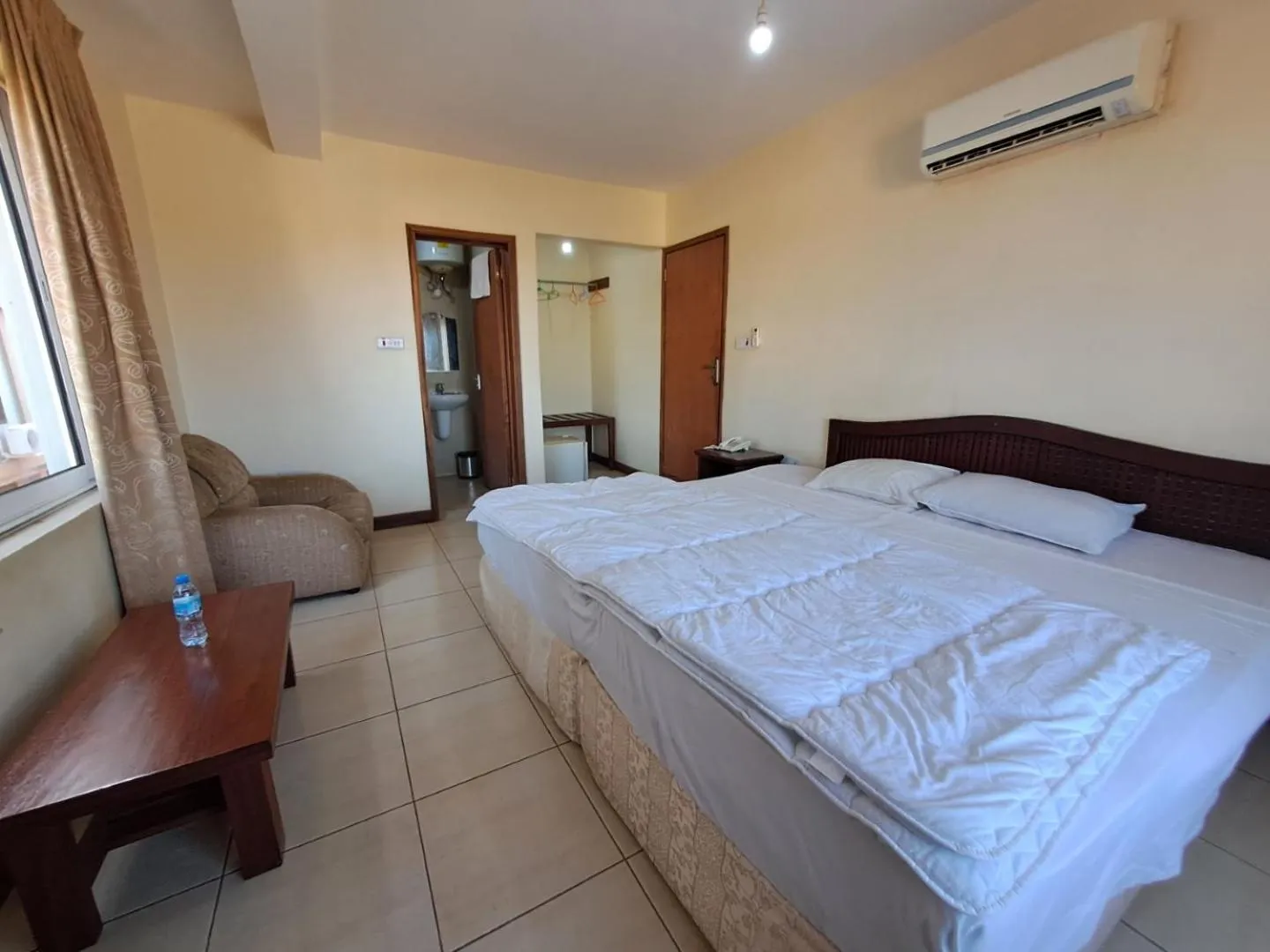 Bed in Moshi Leopard Hotel