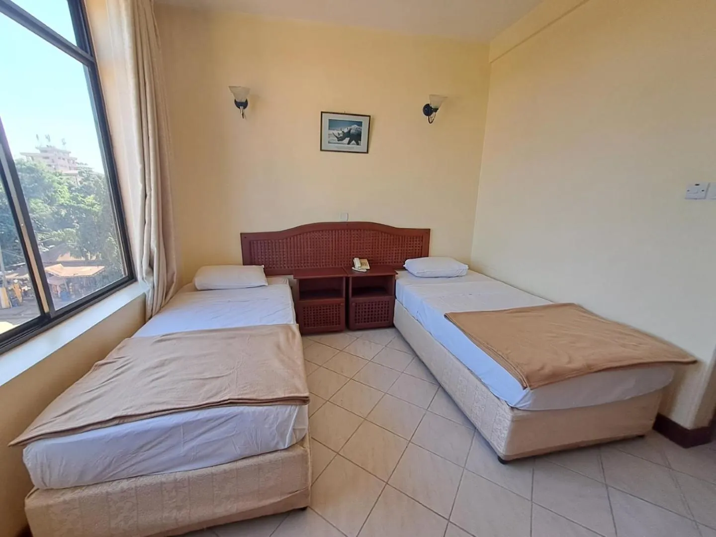 Bed in Moshi Leopard Hotel