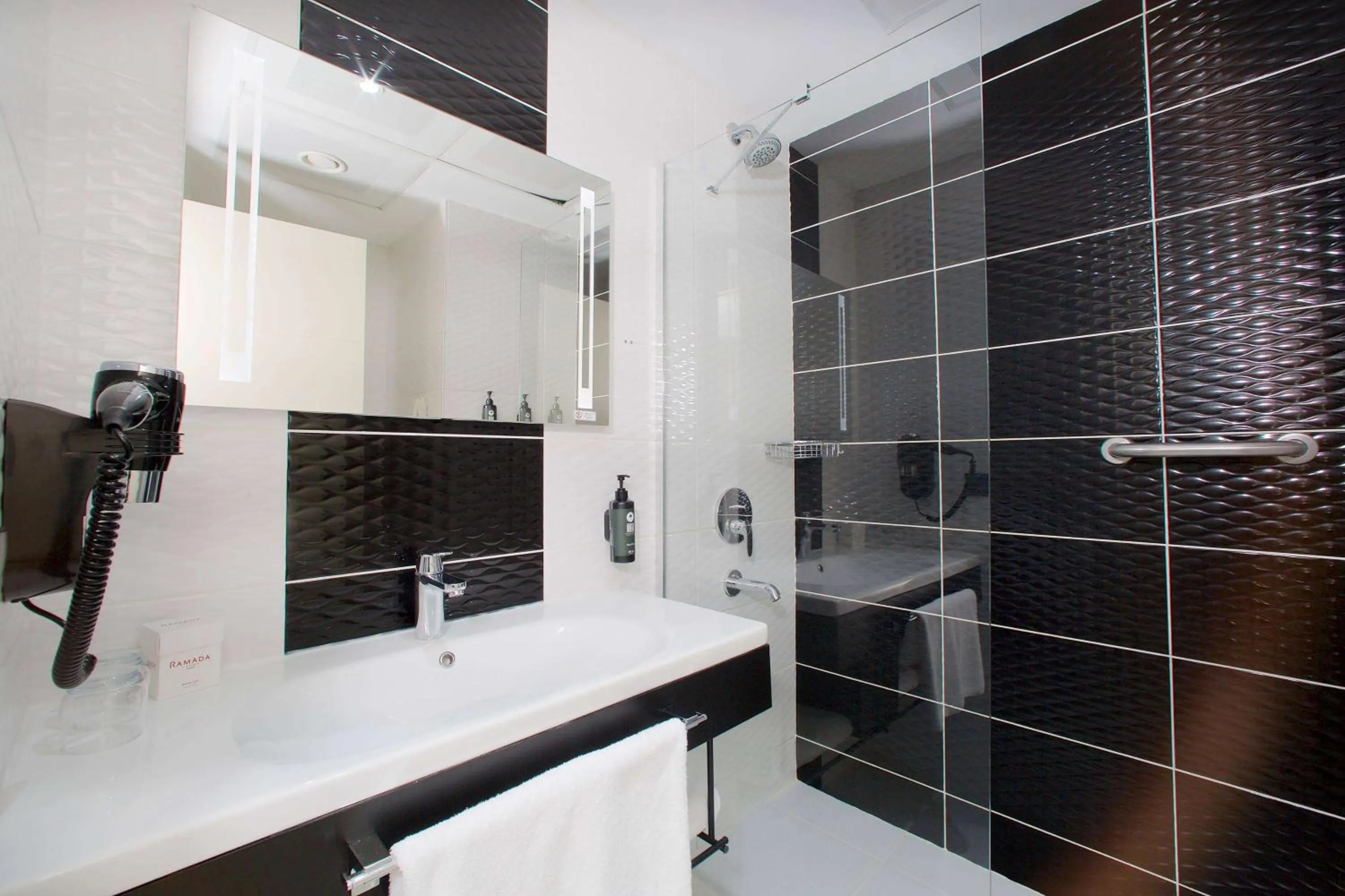 TV and multimedia in Ramada By Wyndham Soma