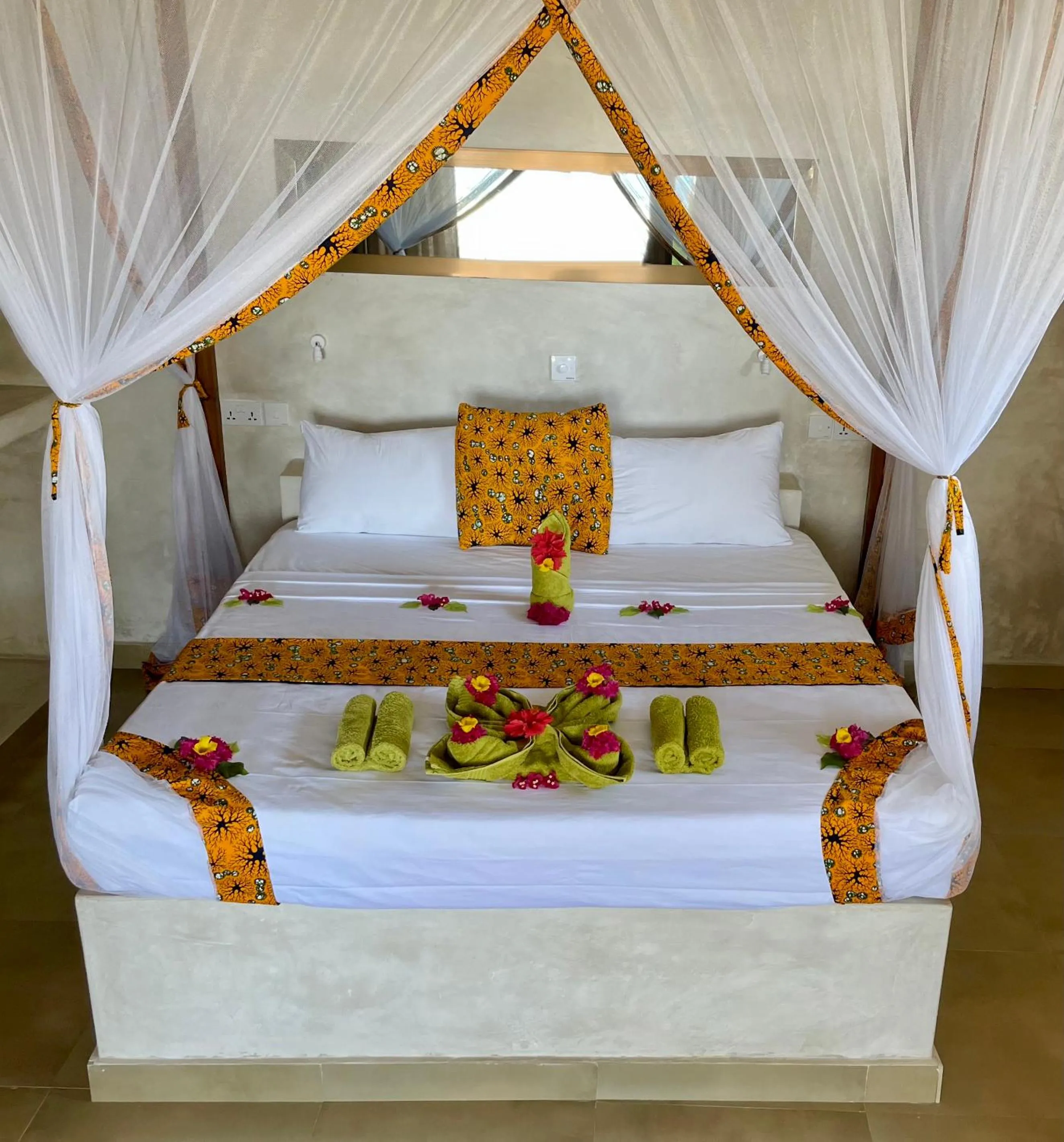 Bed in Blue Reef Sport & Fishing Lodge and Bungalows