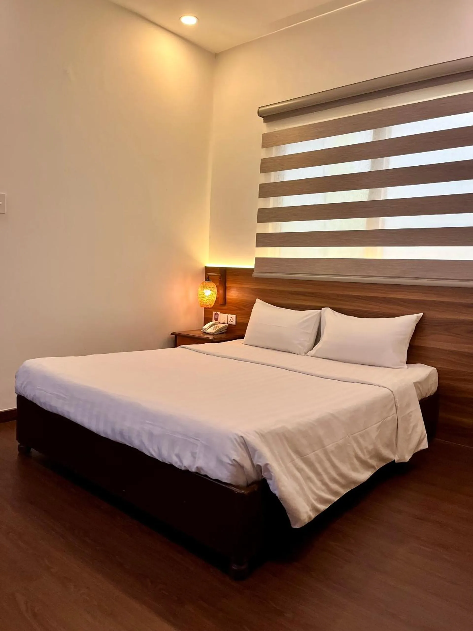 Bed in Lantern Hotel