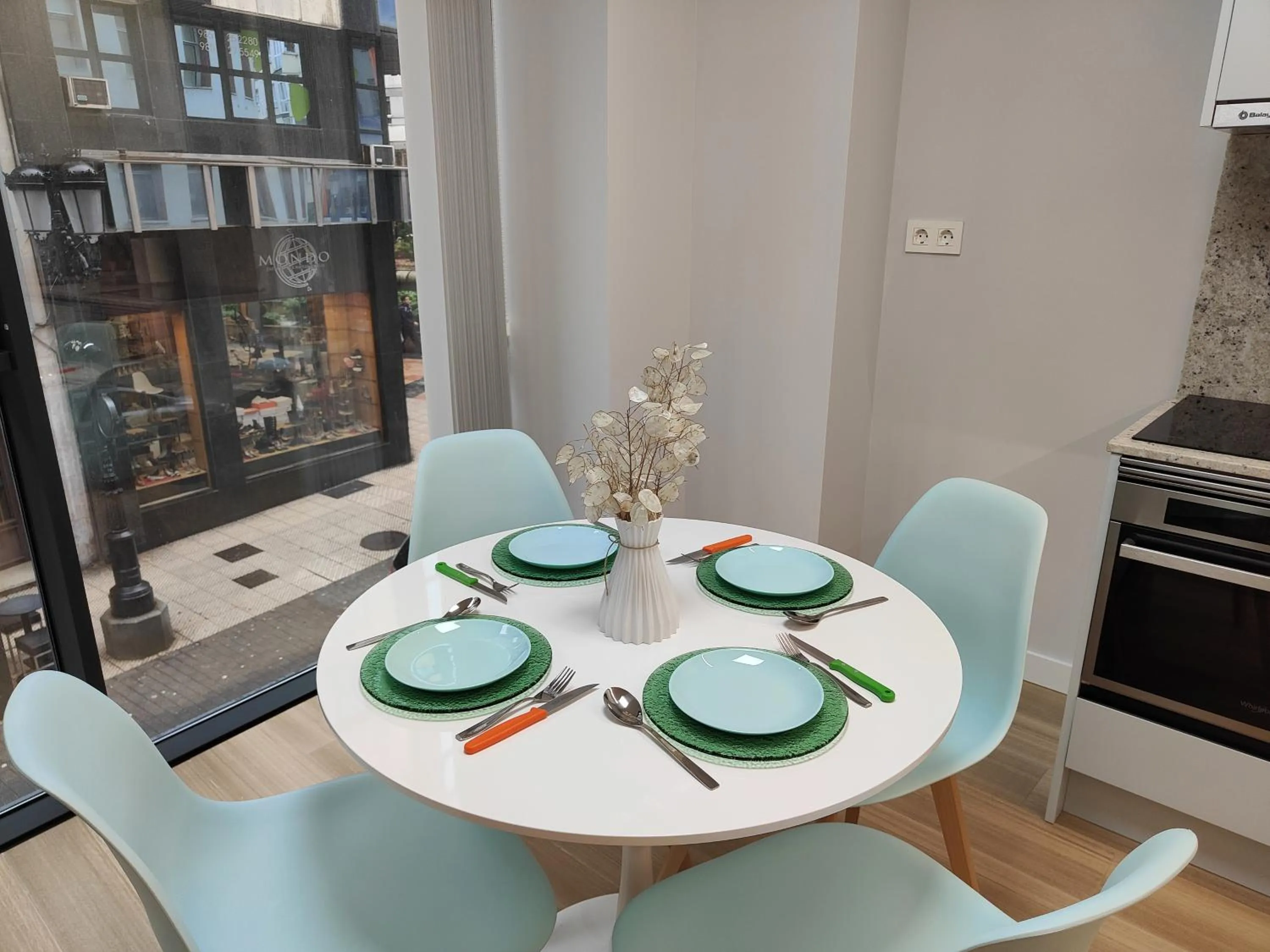 Kitchen or kitchenette in Apartamentos Centro Oviedo Caveda