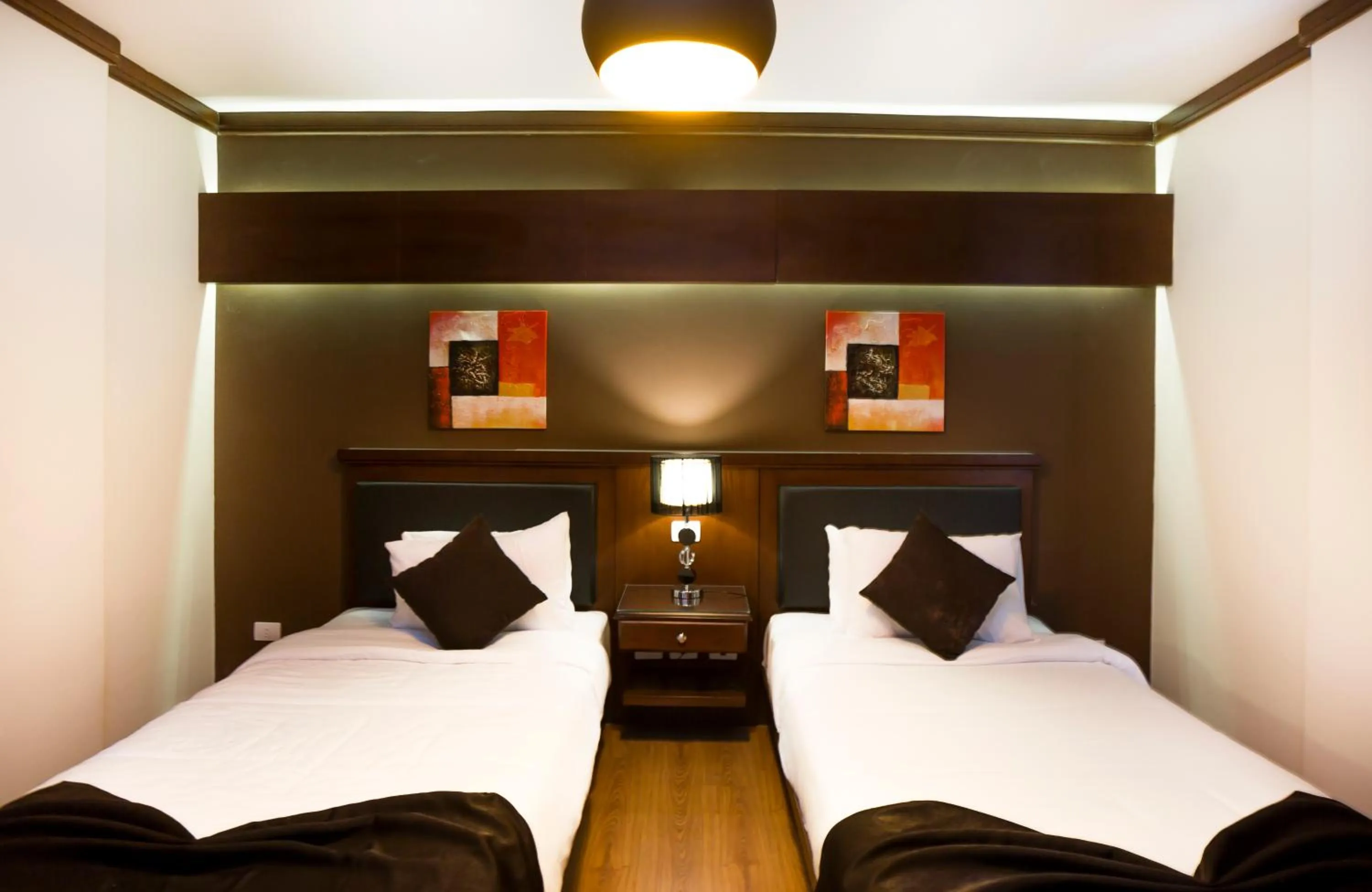 Bedroom, Bed in Panacea Suites Hotel
