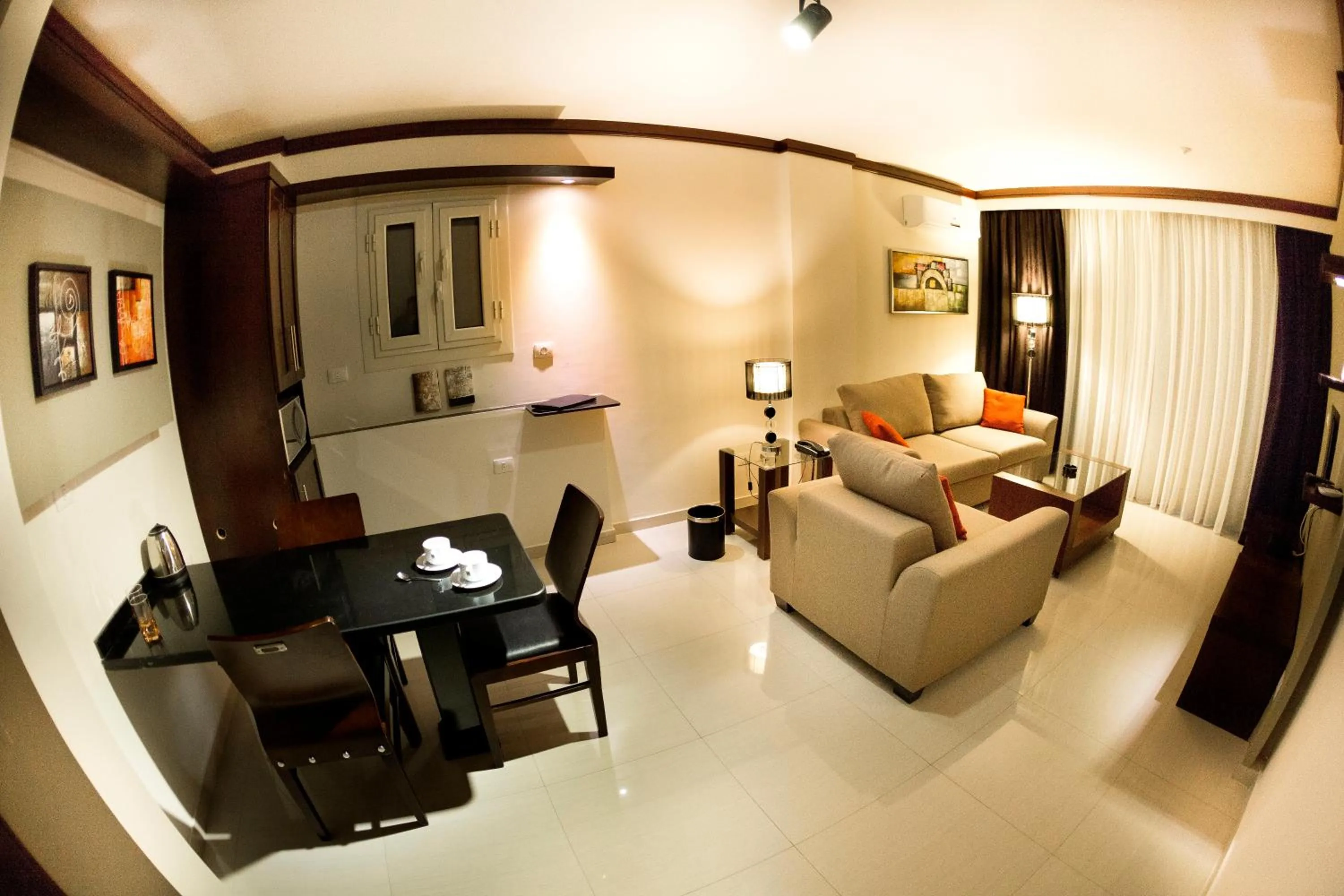 TV and multimedia in Panacea Suites Hotel