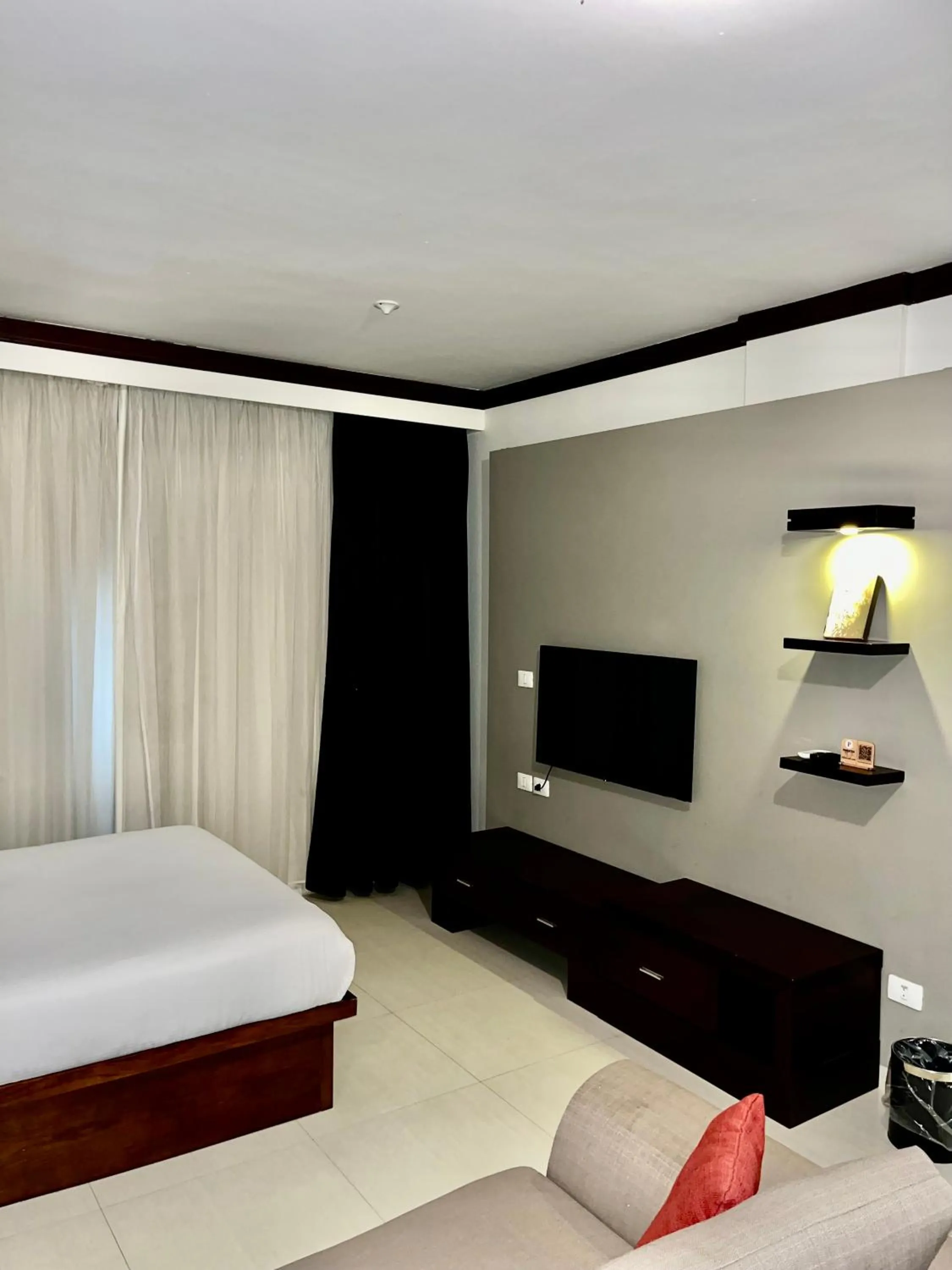 Bed in Panacea Suites Hotel