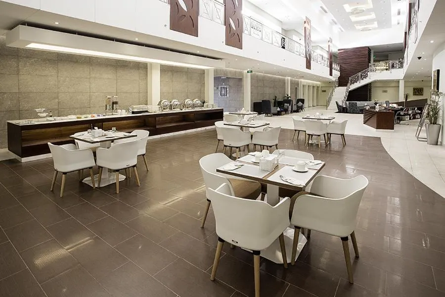 Dining area in لي لي جراند للشقق المخدومة - درجة اقتصادية