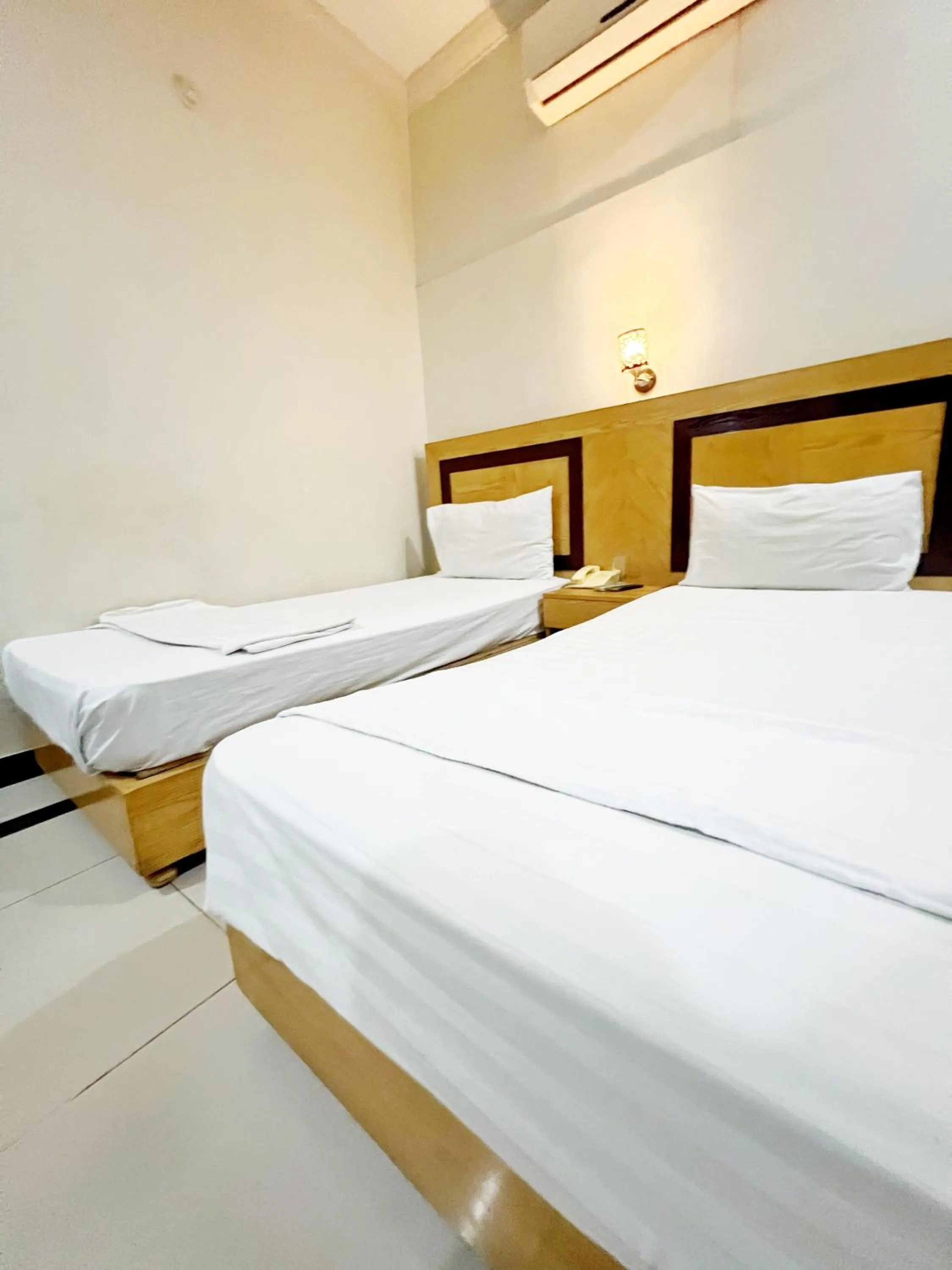 Bed in The Grand Hotel Multan