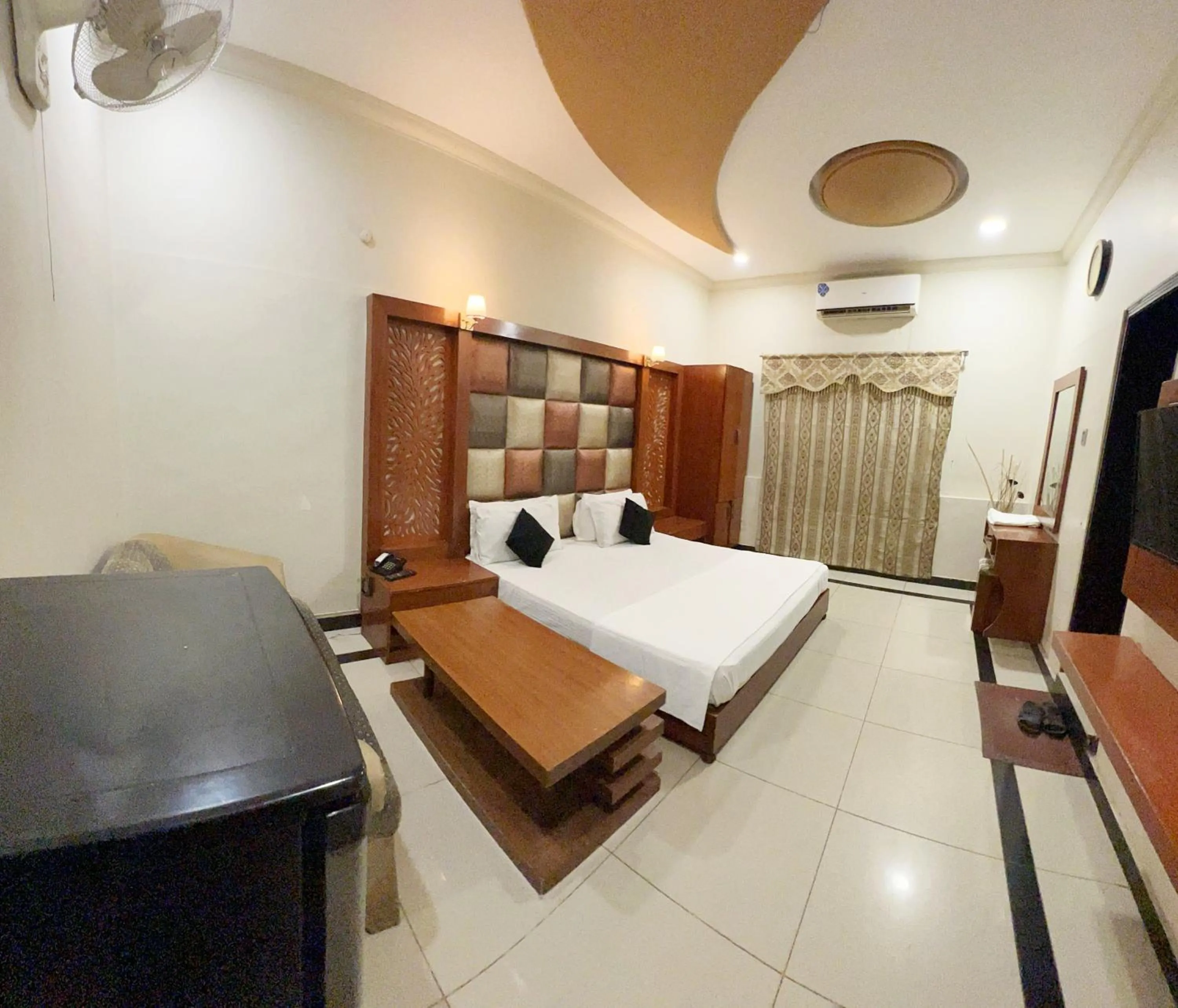 Bed in The Grand Hotel Multan