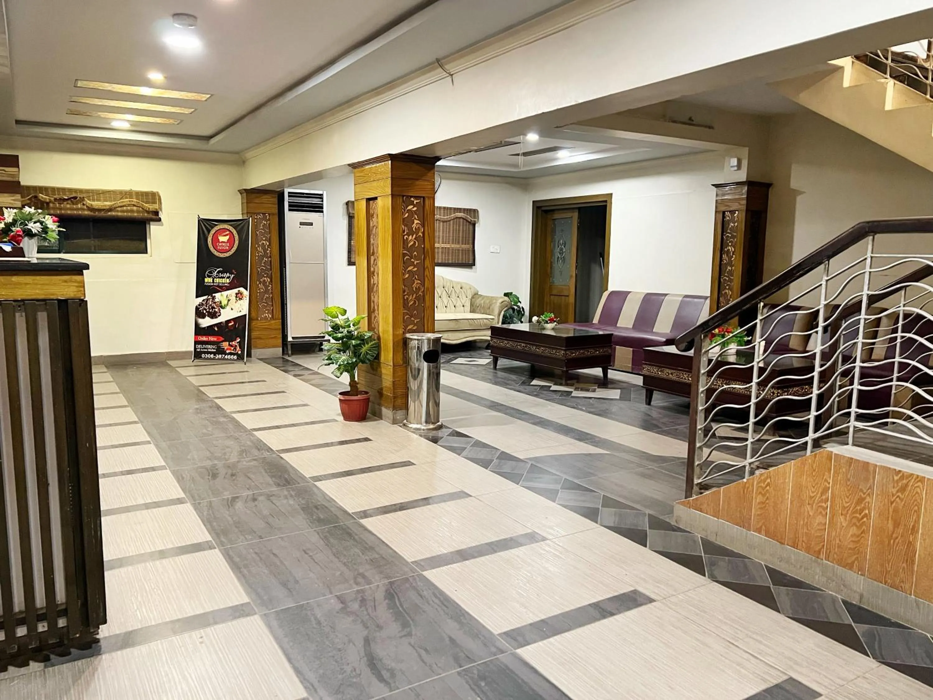 Lobby or reception in The Grand Hotel Multan