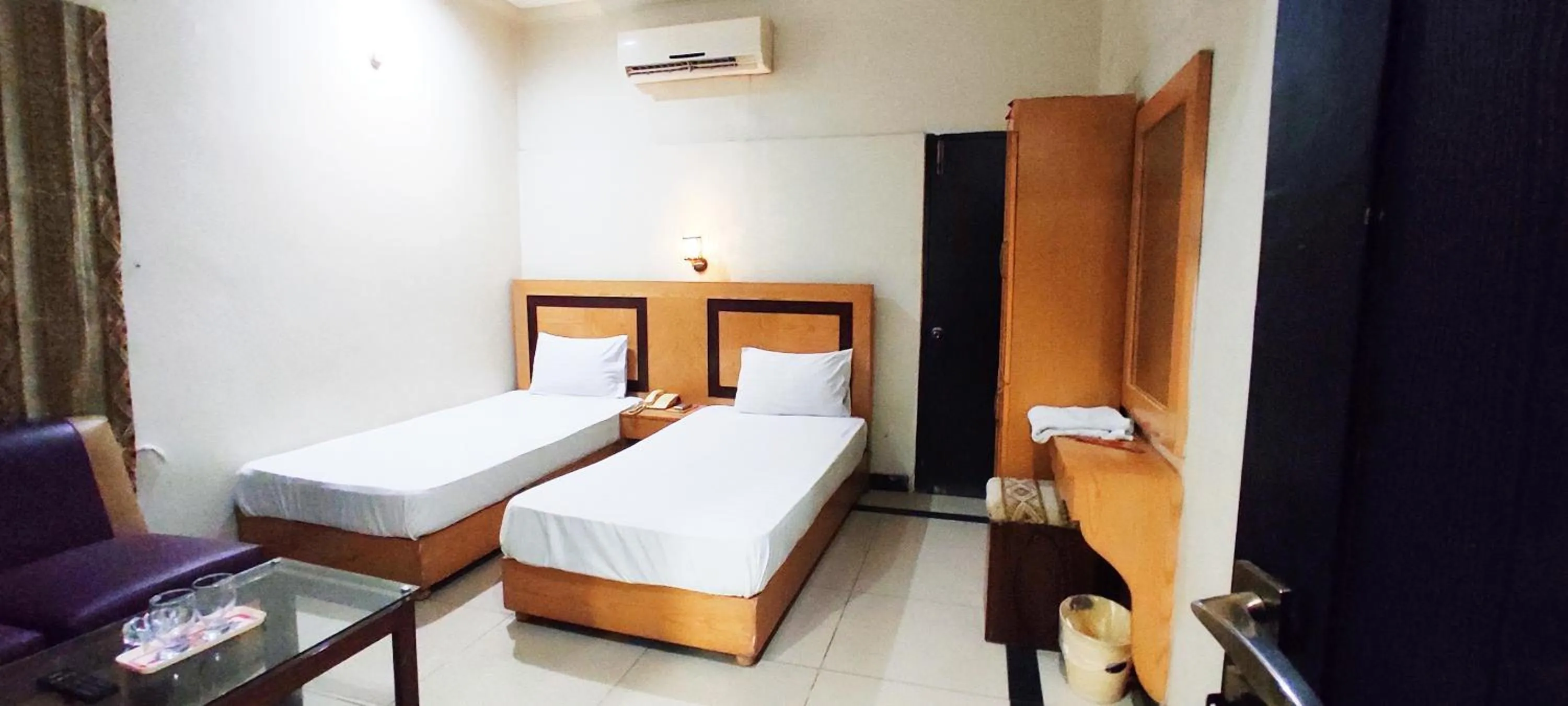 Bed in The Grand Hotel Multan