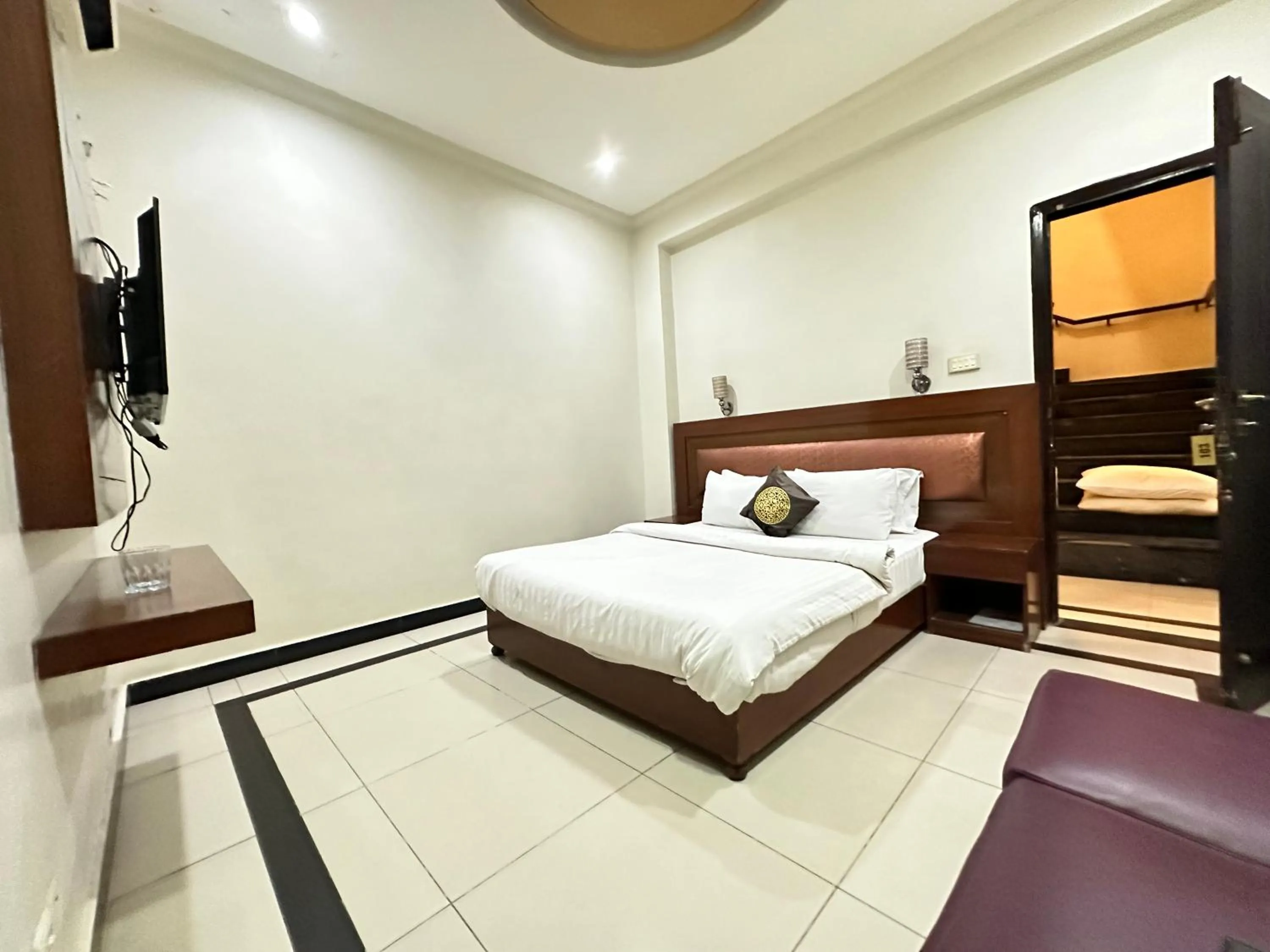 Bed in The Grand Hotel Multan