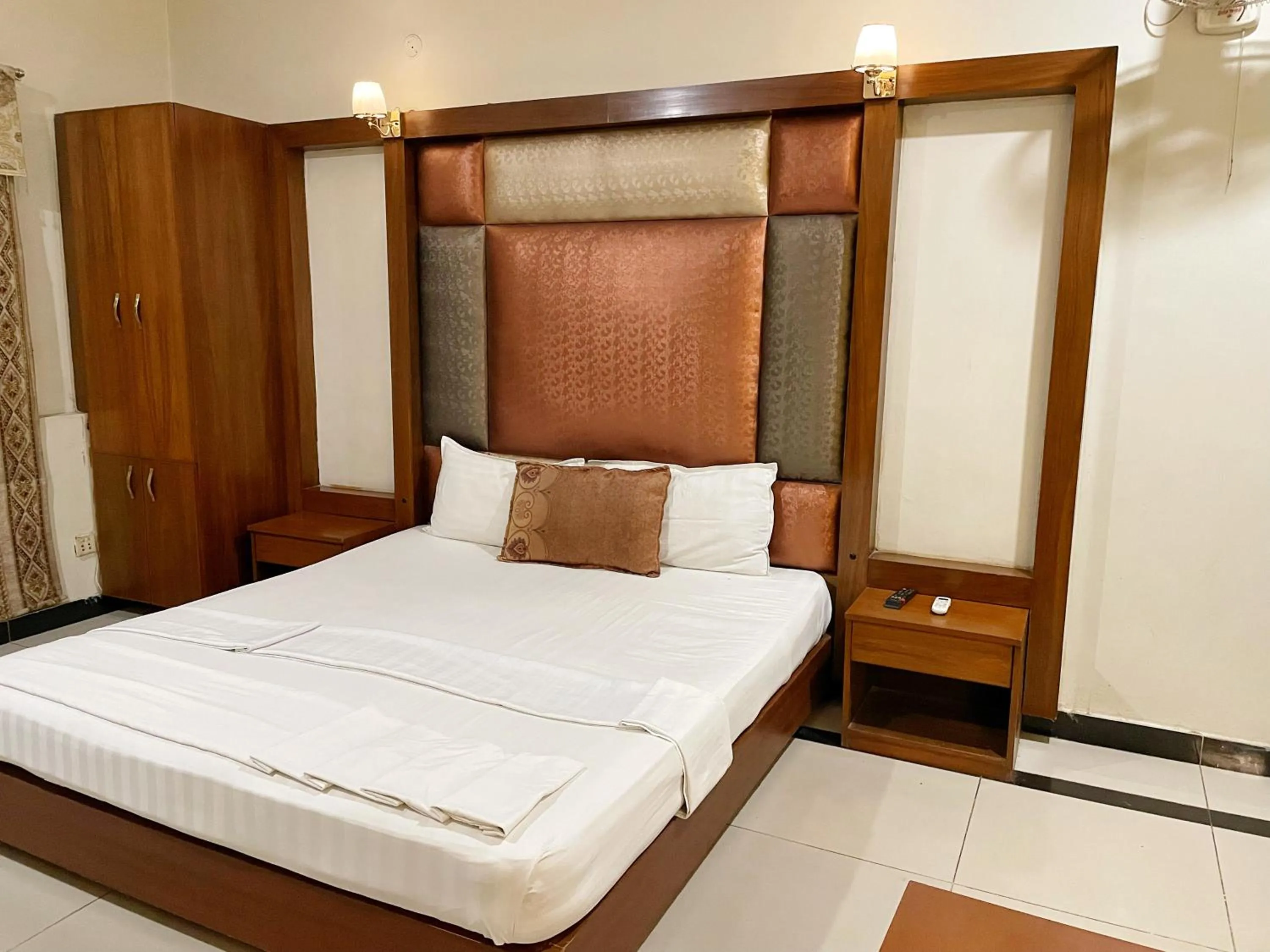 Bed in The Grand Hotel Multan